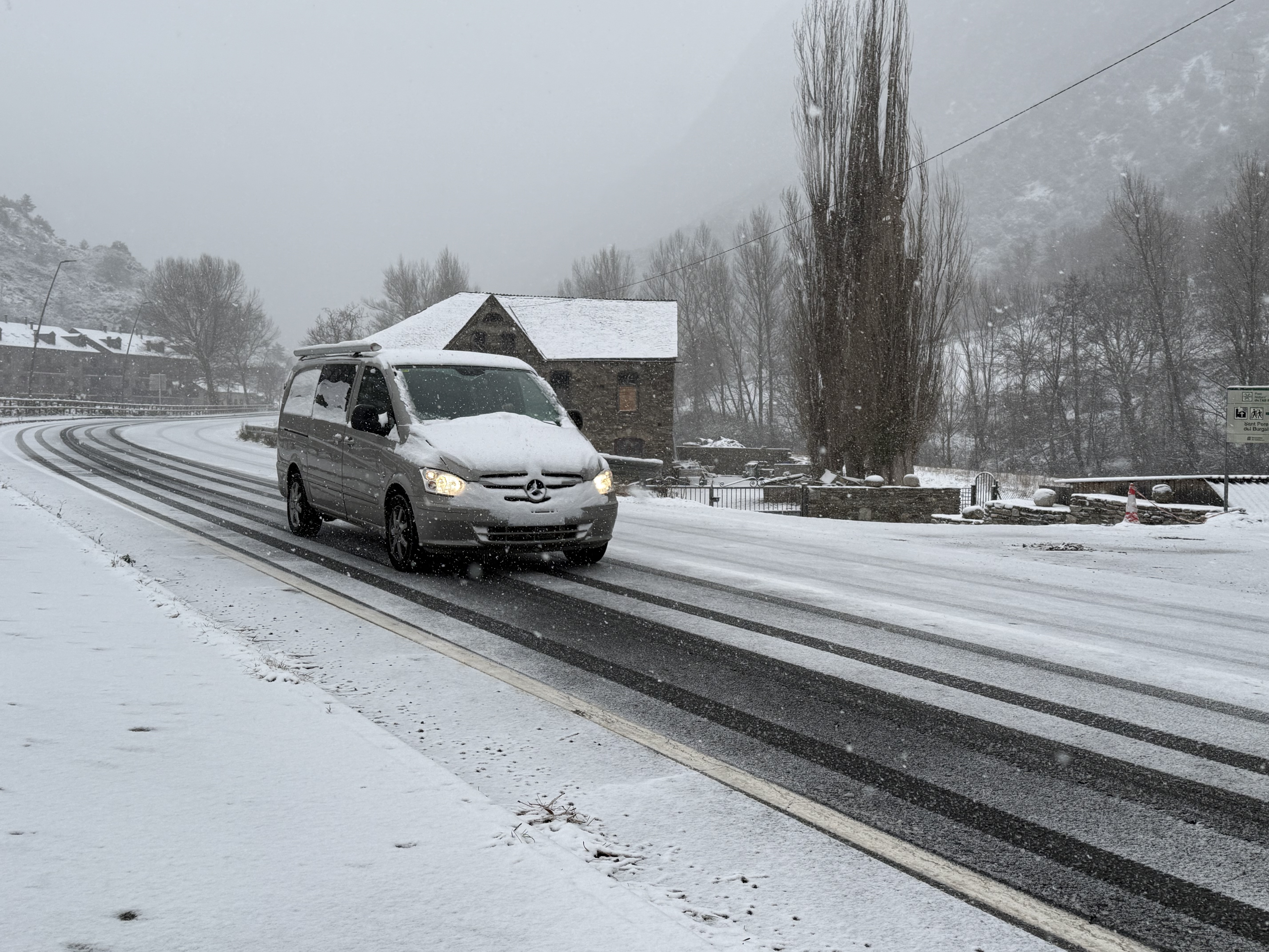 A car driving on the C-13 in Escaló, in the Pallars Sobirà county