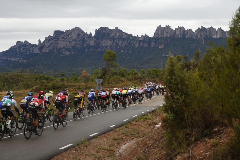 La Vuelta 2023 riders approach the iconic Montserrat mountain