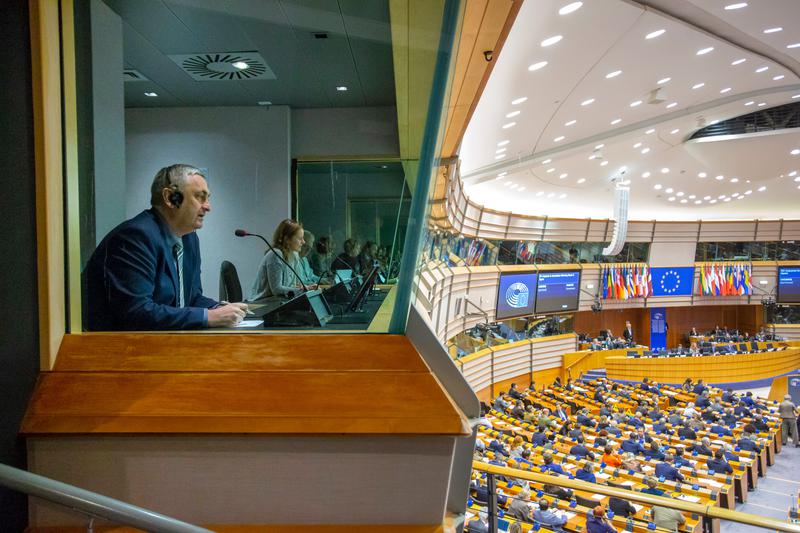 Interpreters working at the European Parliament during a plenary session in Brussels