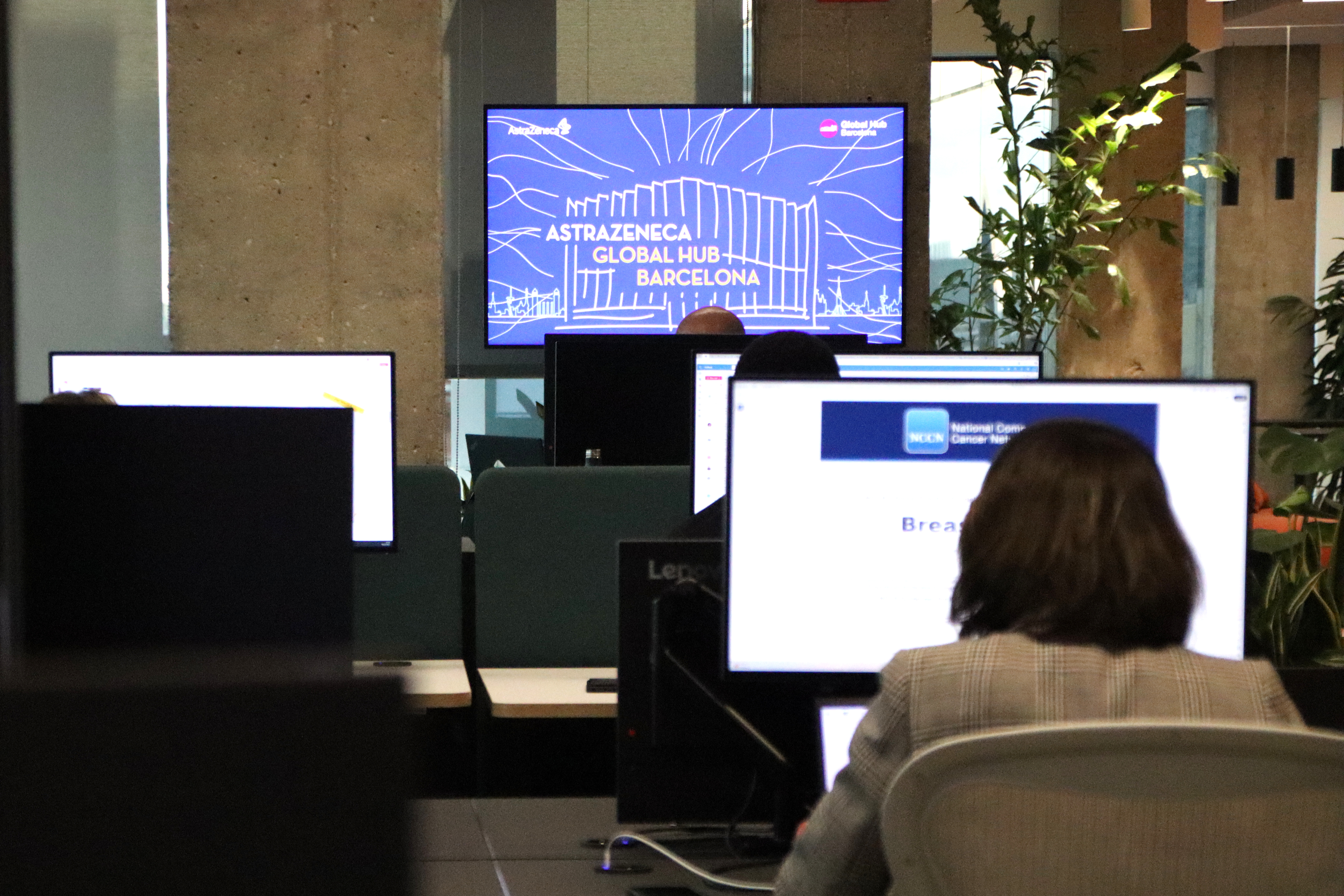 AstraZeneca employees working at the company's new global hub in Barcelona's Estel Building