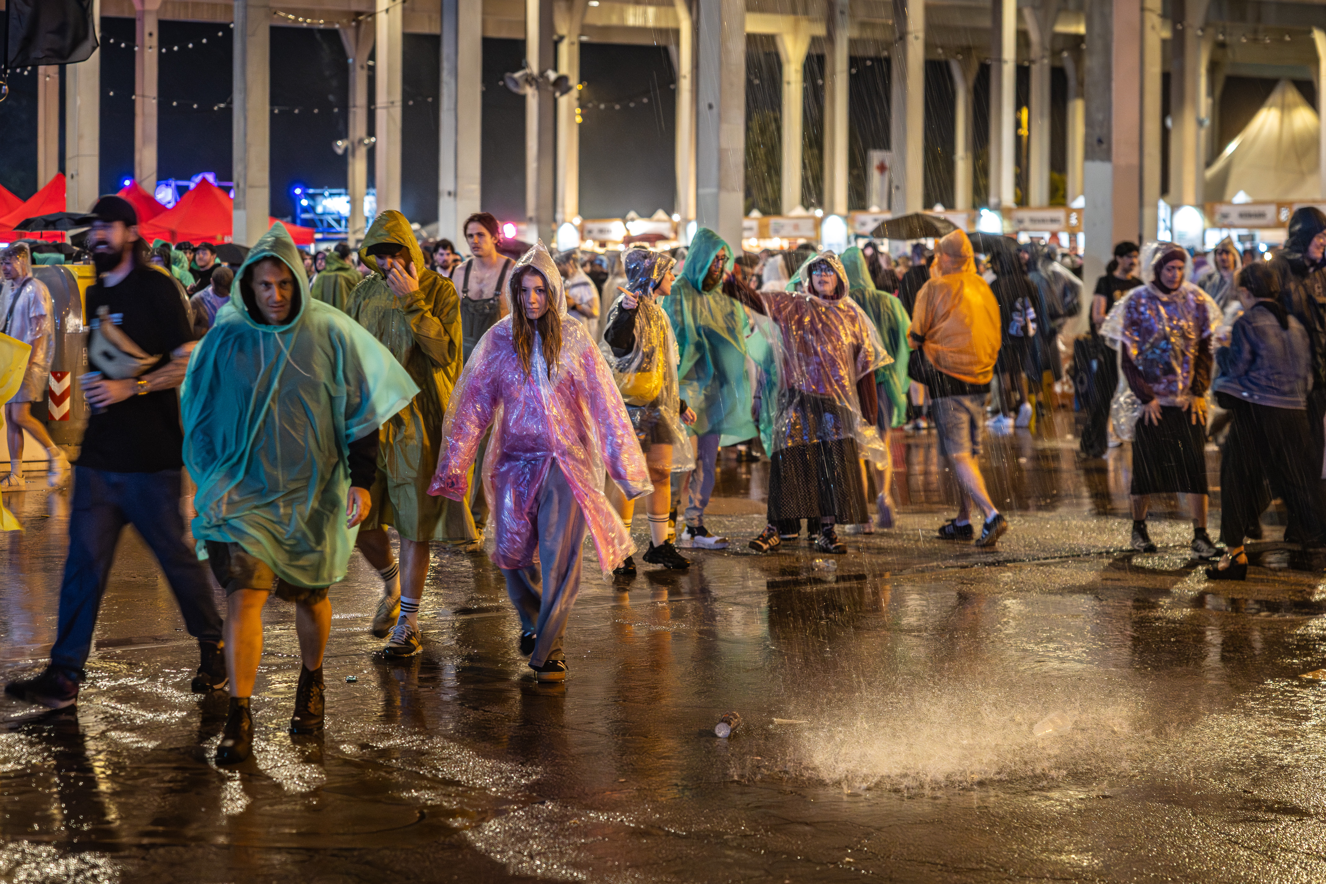 Fans getting soaked in the rain on the first day of Primavera Sound 2026