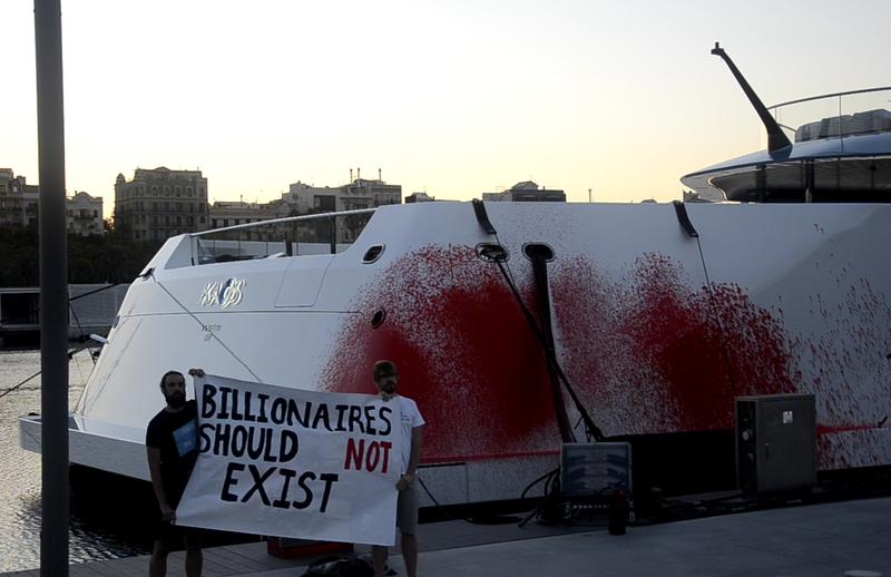 Scientific Rebellion and Rebellion or Extinction activists in Barcelona's harbor.