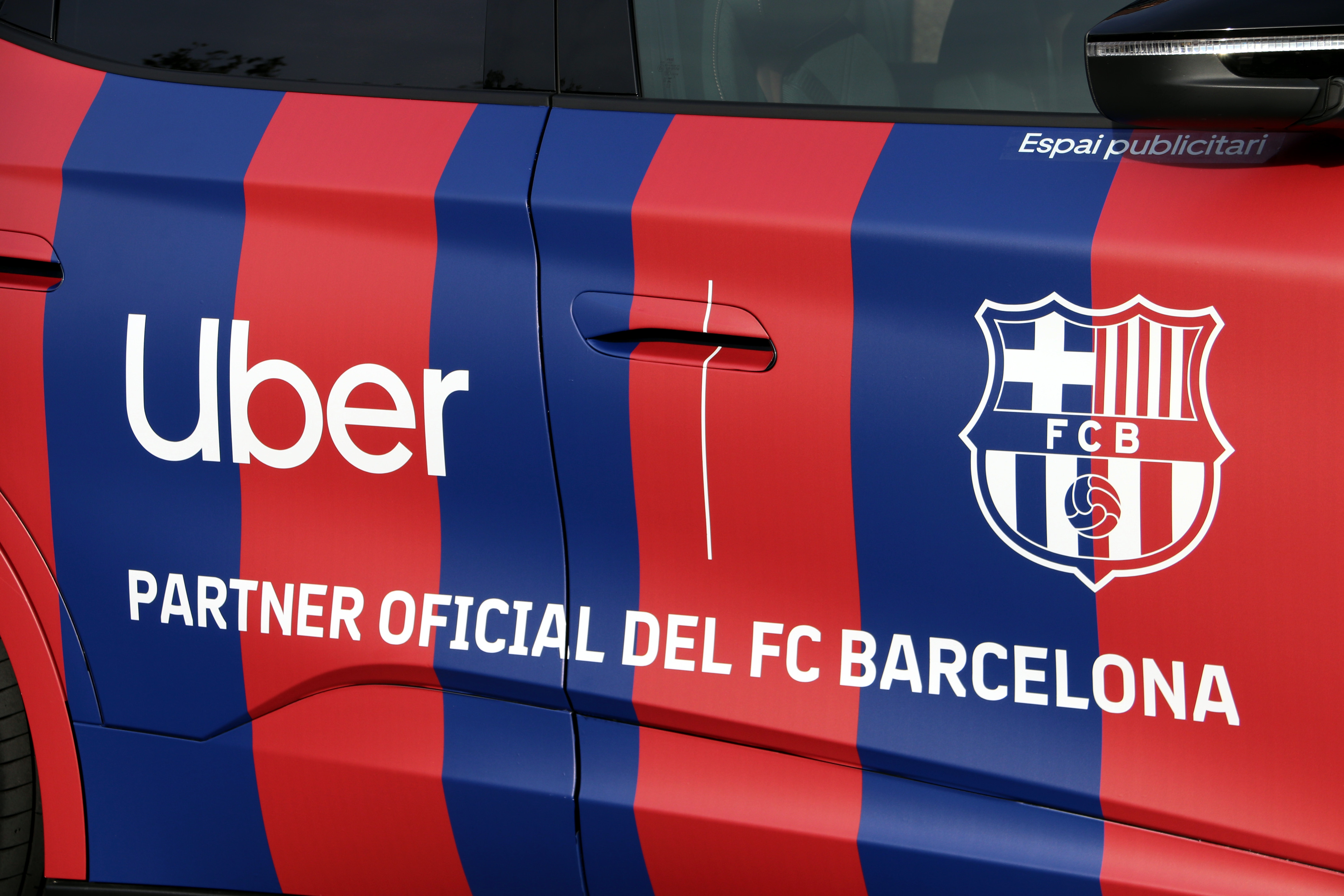 A car with the Uber and FC Barcelona logos at the signing ceremony of the sponsorship agreement between the club and the platform