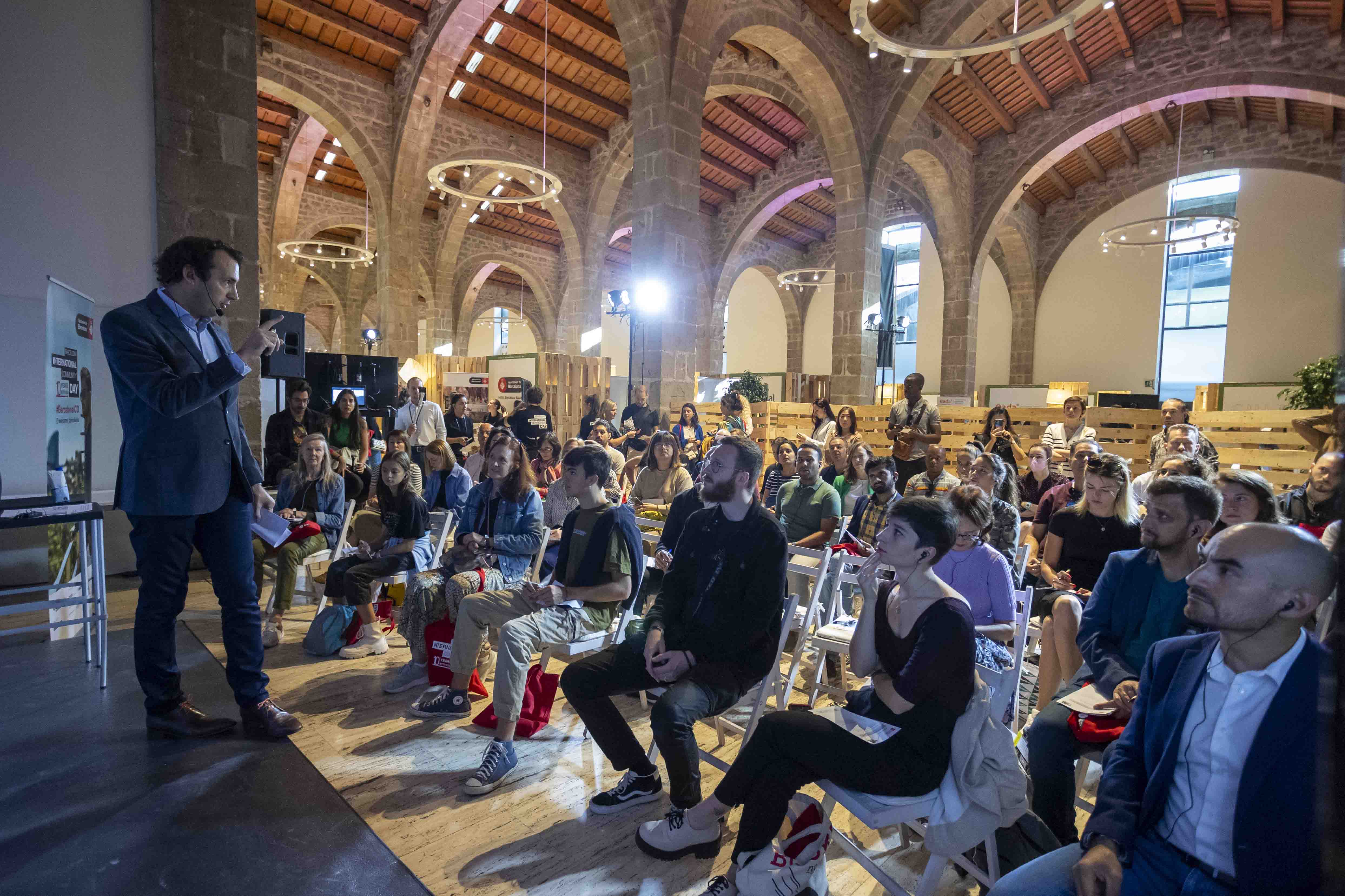 Visitors attending a conference at the 2023 Barcelona International Community Day