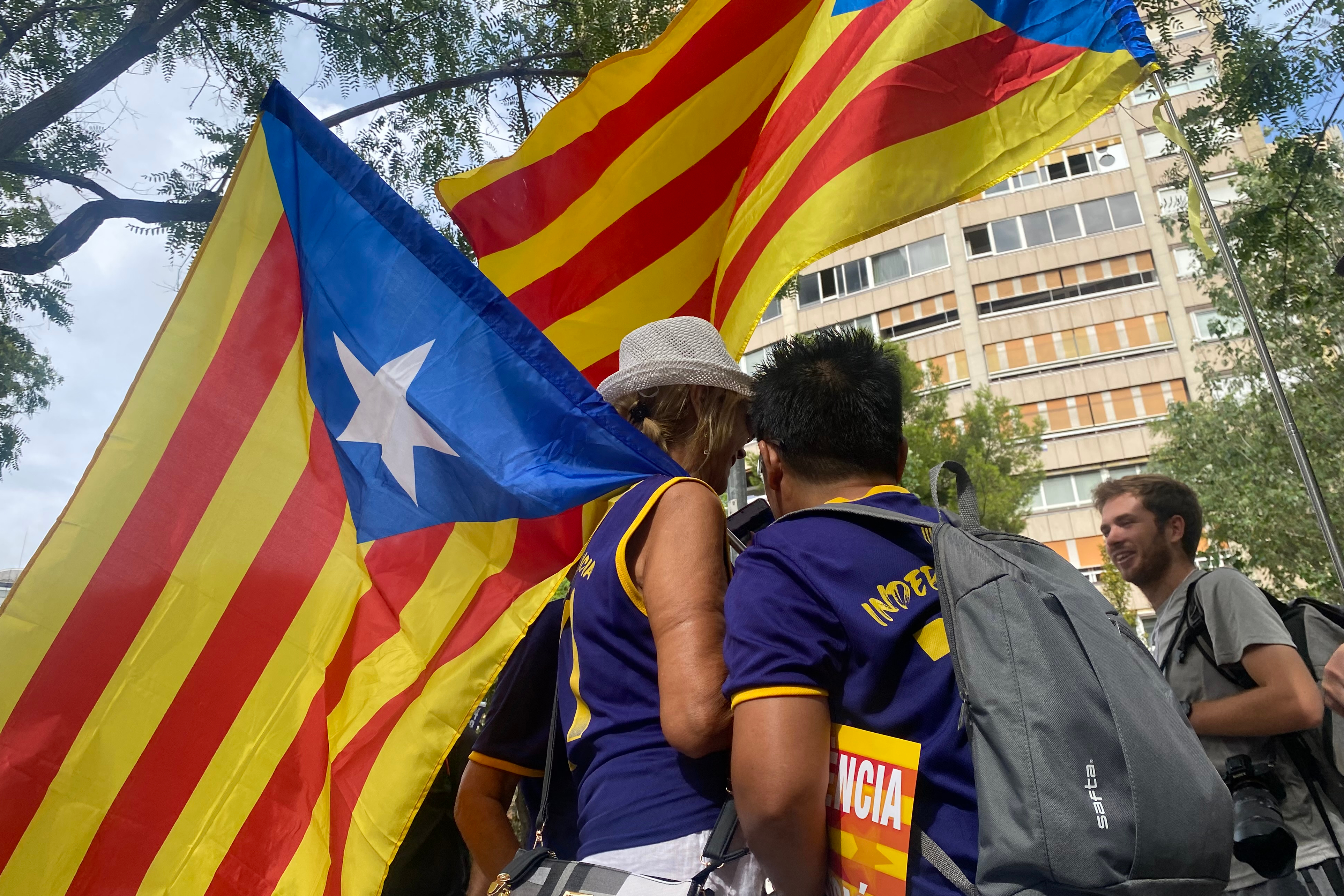 Catalan pro-independence supporters ahead of a mass demonstration in Barcelona on September 11, 2023