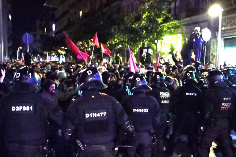 Police face demonstrators during the protest against the eviction of La Antiga Massana building in Barcelona