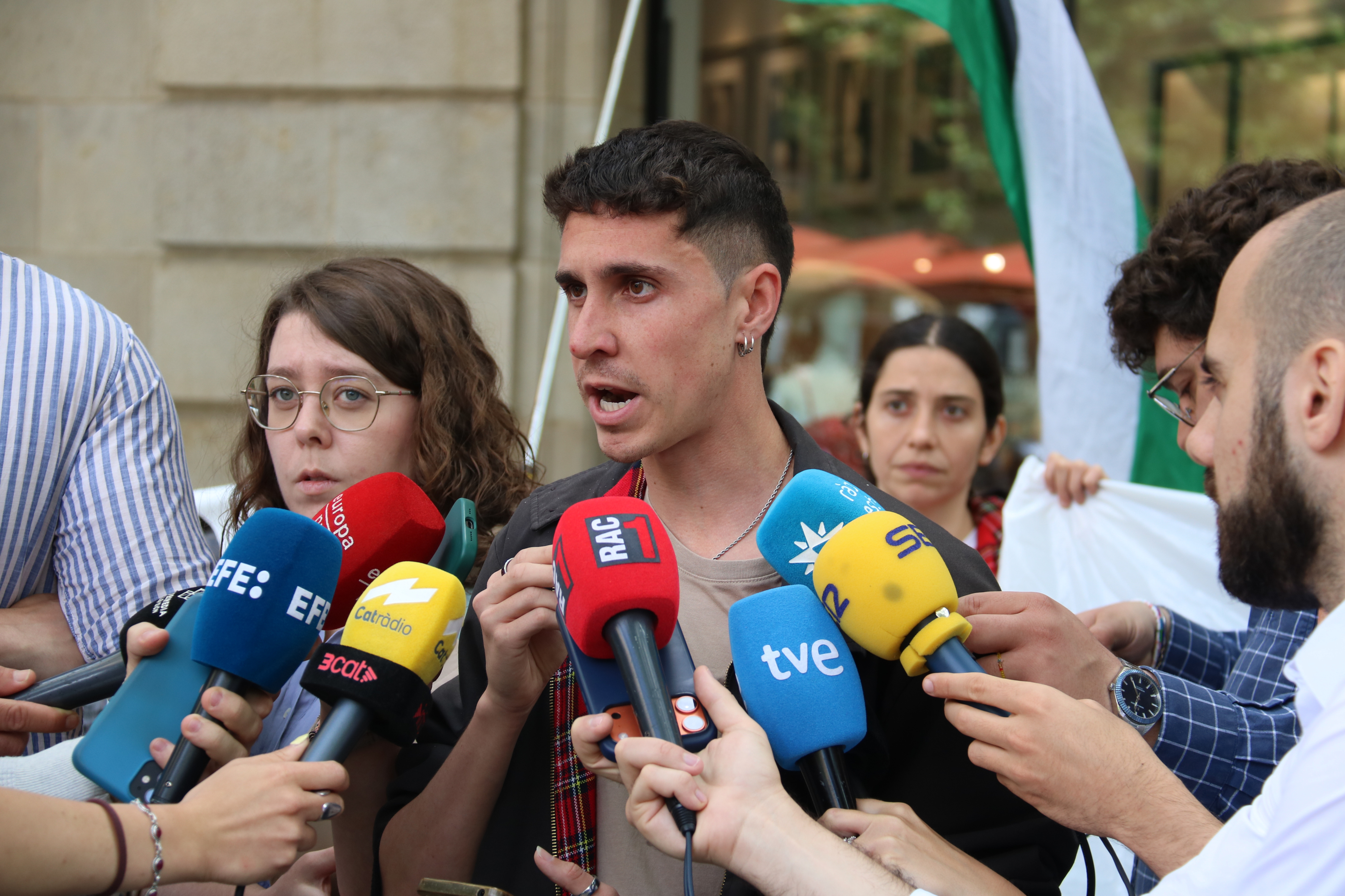Pablo Castilla, spokesperson for the Global Sumud Flotilla in Catalonia, addresses the media outside the European Commission office in Barcelona