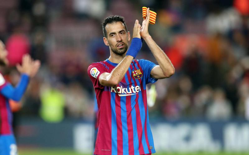 Sergio Busquets applauds the crowd after a match