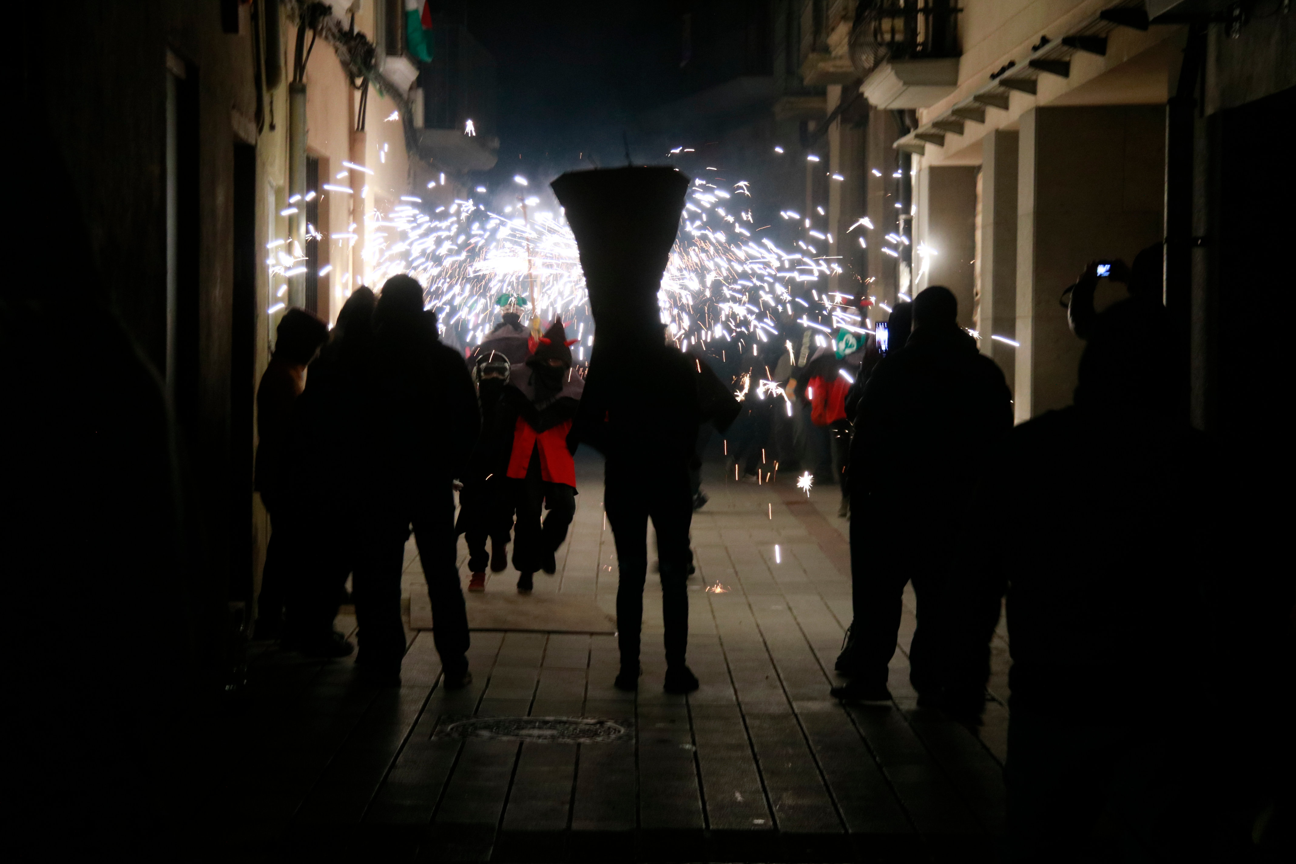 'Diables' leaping under a shower of sparks