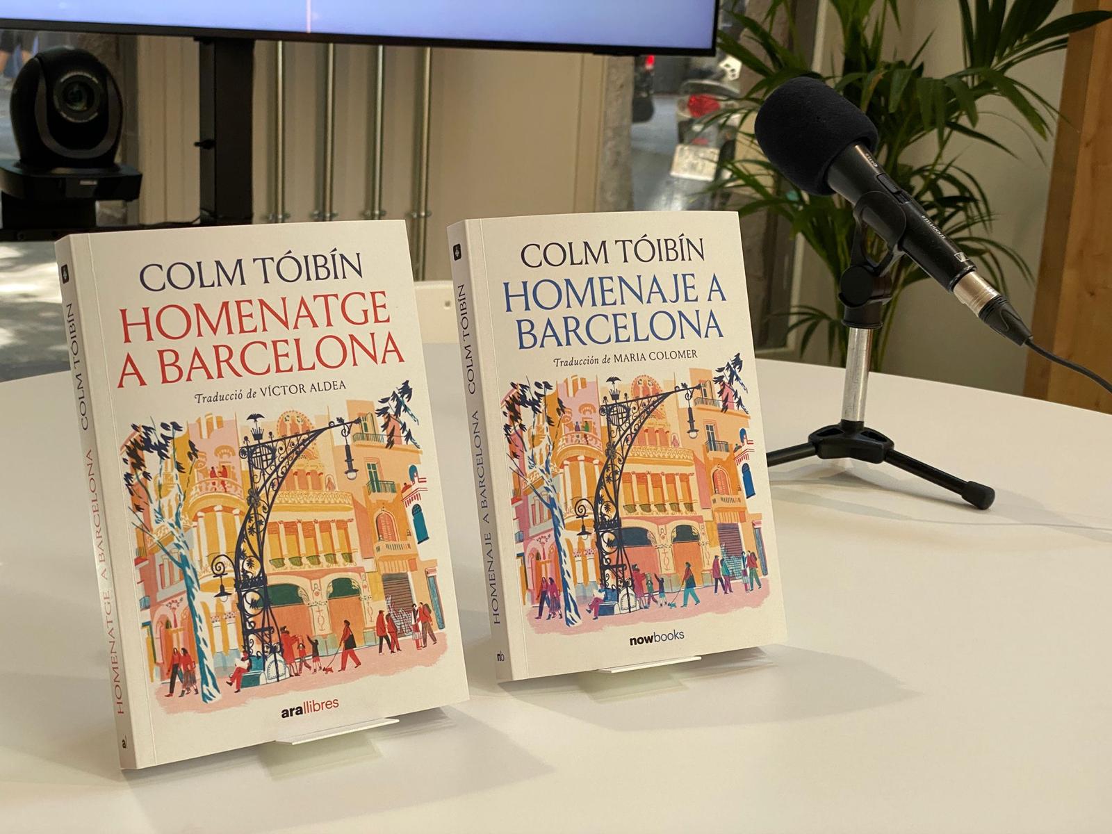 New editions of Colm Tóibín's book 'Homenage to Barcelona' displayed side by side in Catalan and Spanish