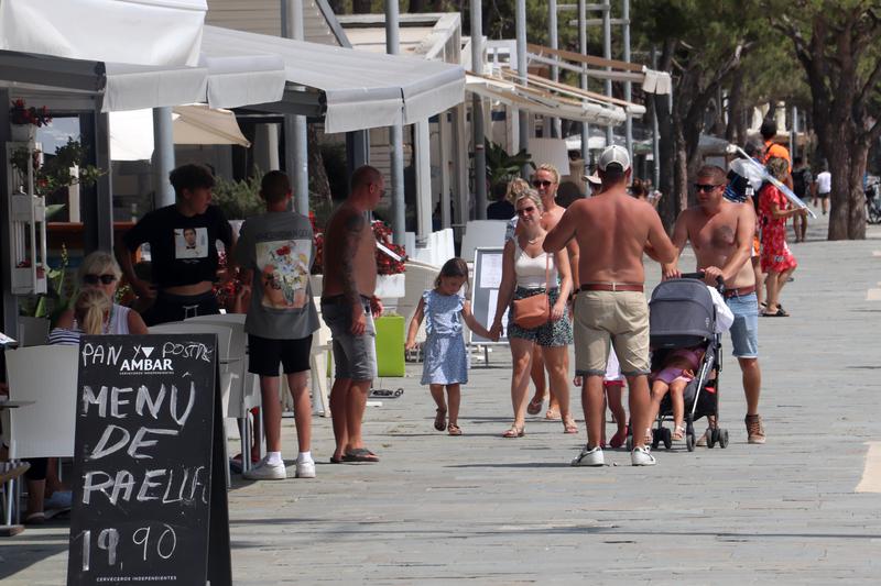 Tourists walking in Platja d'Aro