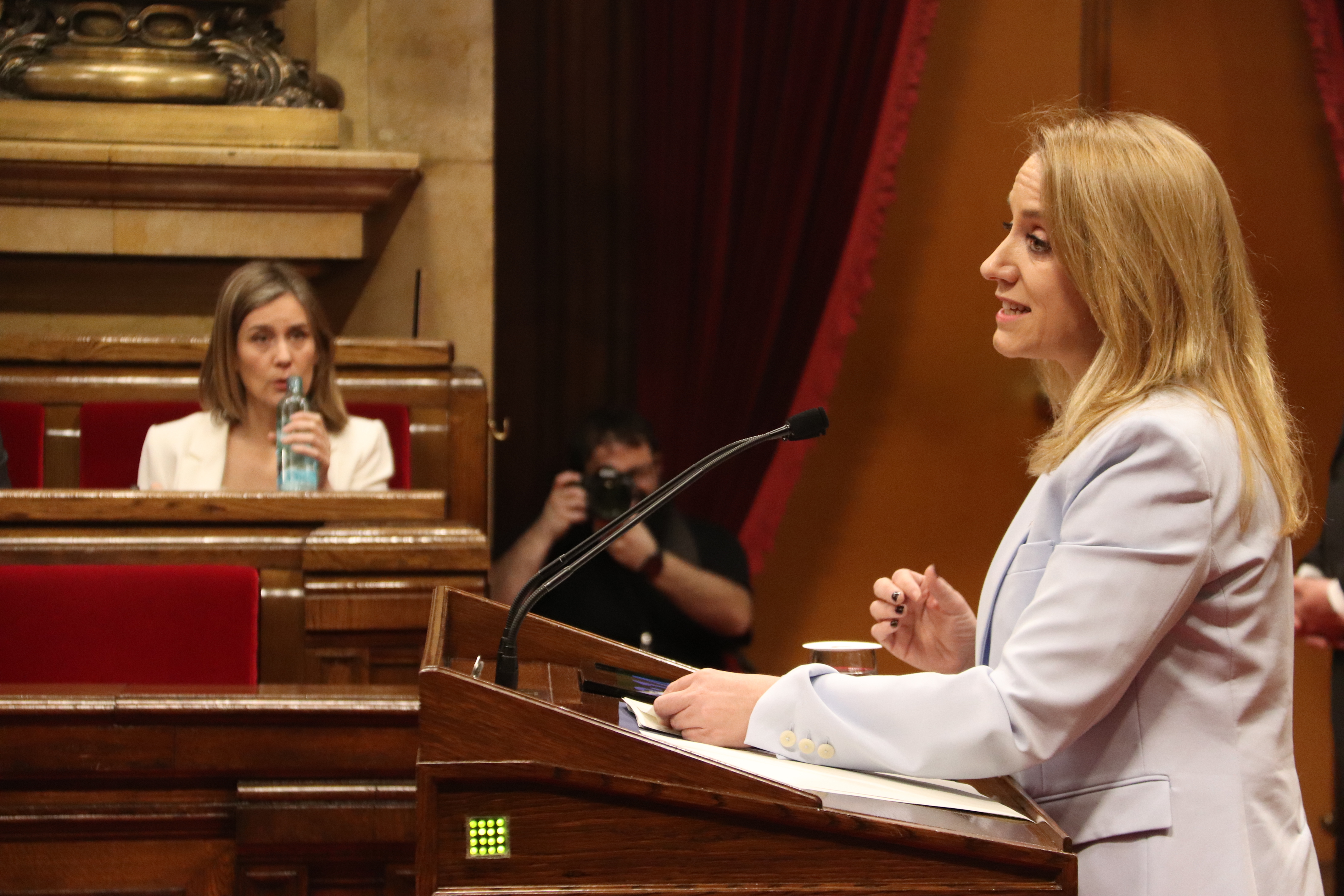 Catalan Economy Minister, Natàlia Mas Guix, addresses Parliament as Comuns' Jéssica Albiach looks on
