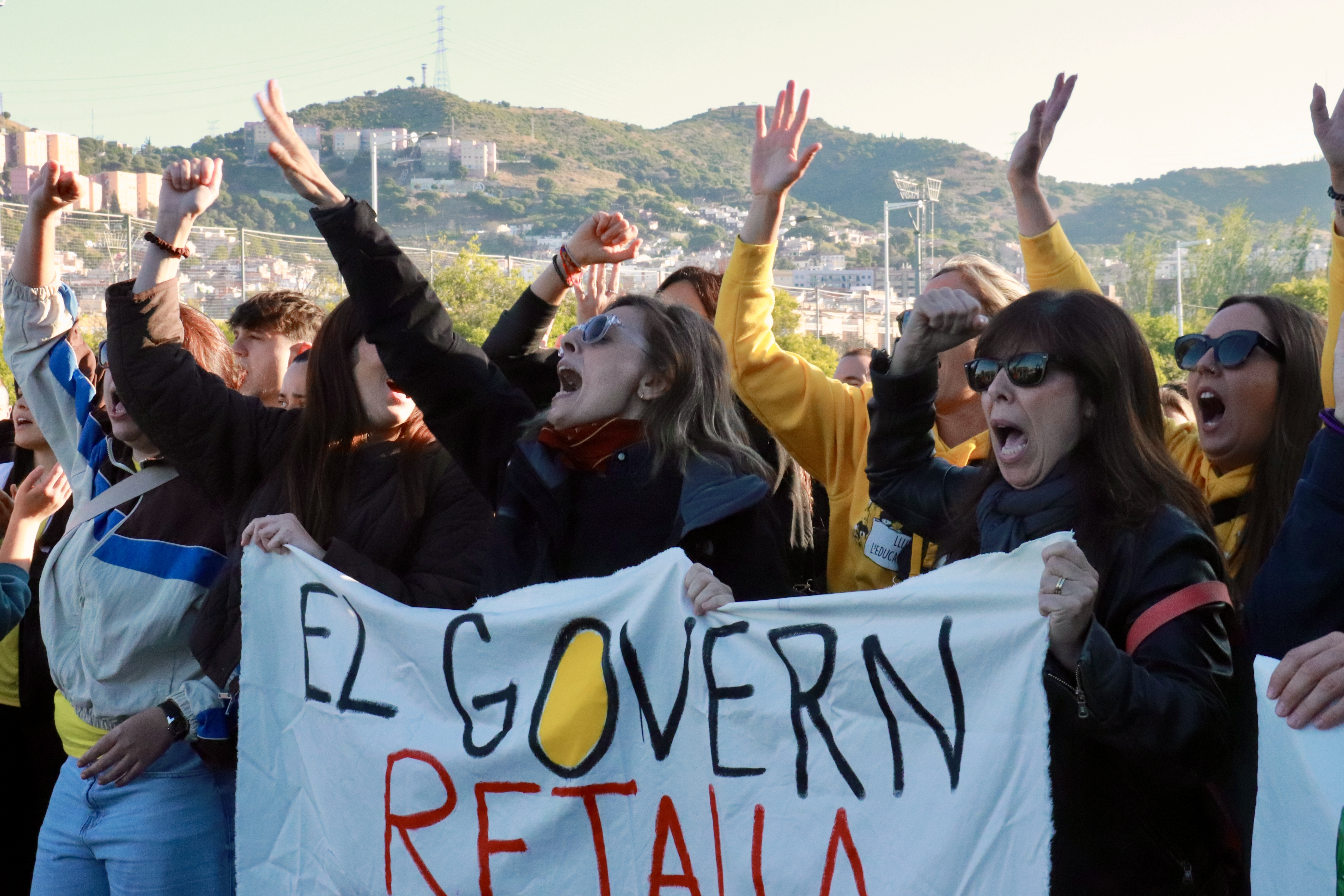 Teachers chant while blocking the B-20 at Santa Coloma