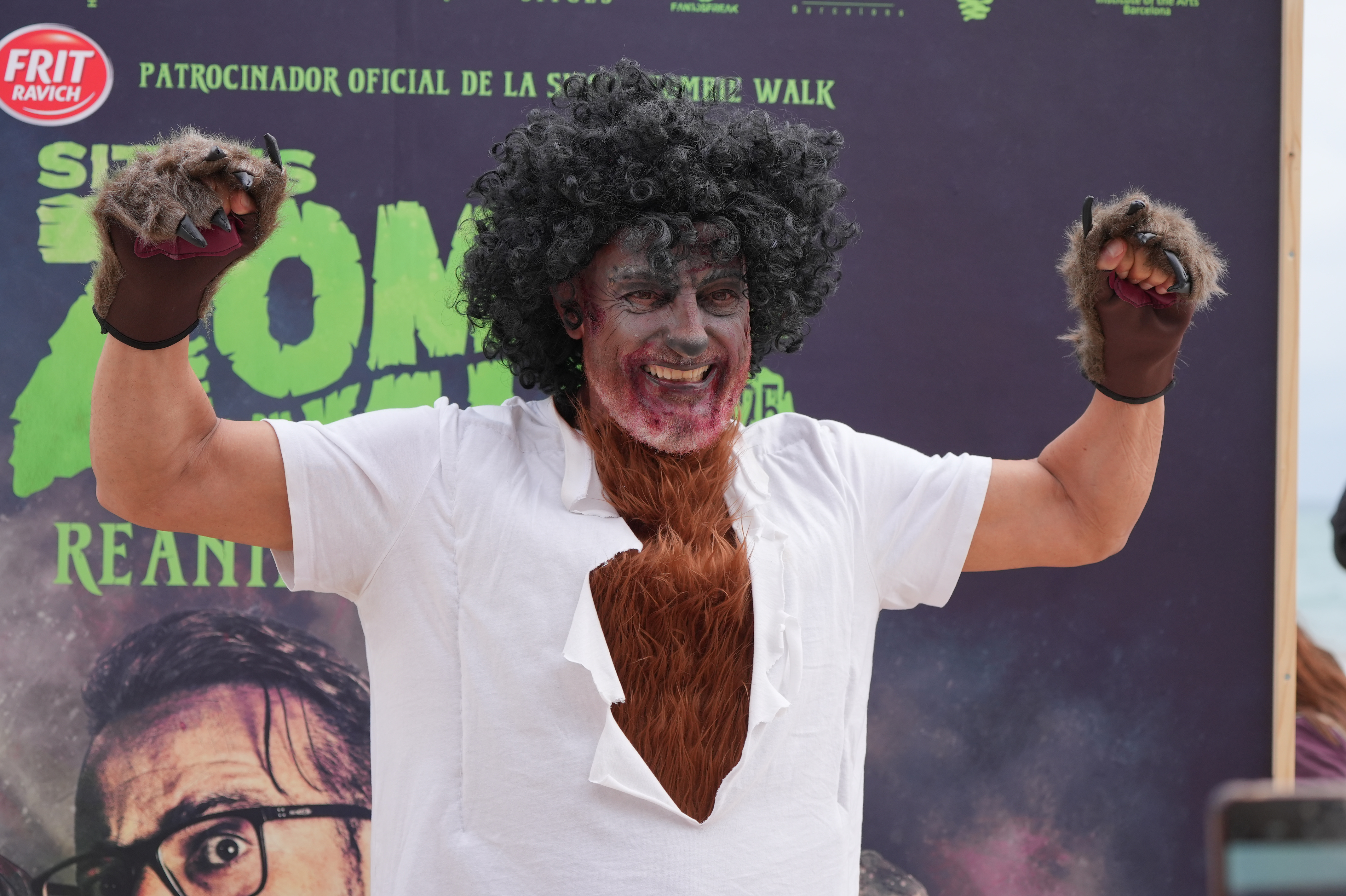 A man wearing a werewolf costume before the legendary parade