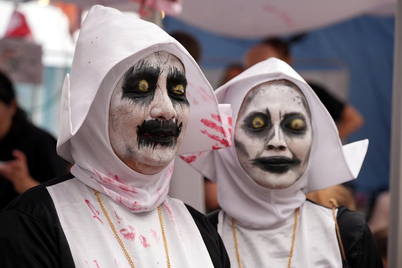 Two people disguised as scary nuns ahead of the Sitges Zombie Walk
