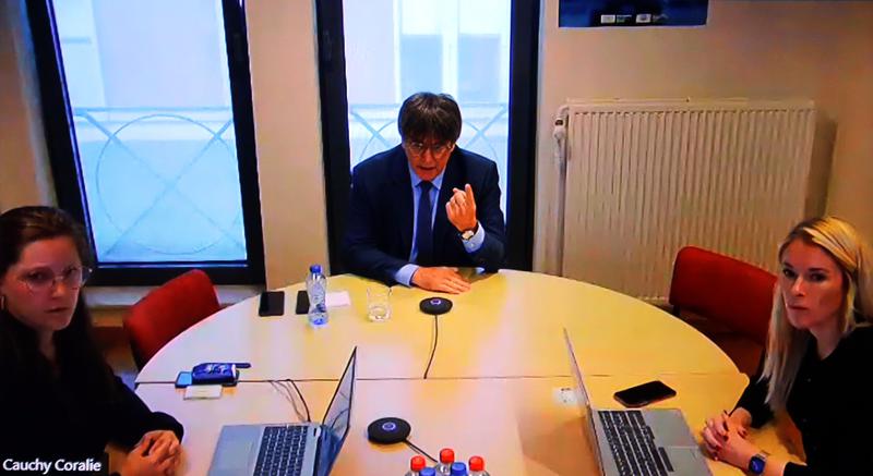 Former Catalan president Carles Puigdemont gives testimony via video link in the trial of ex-interior minister Miquel Buch