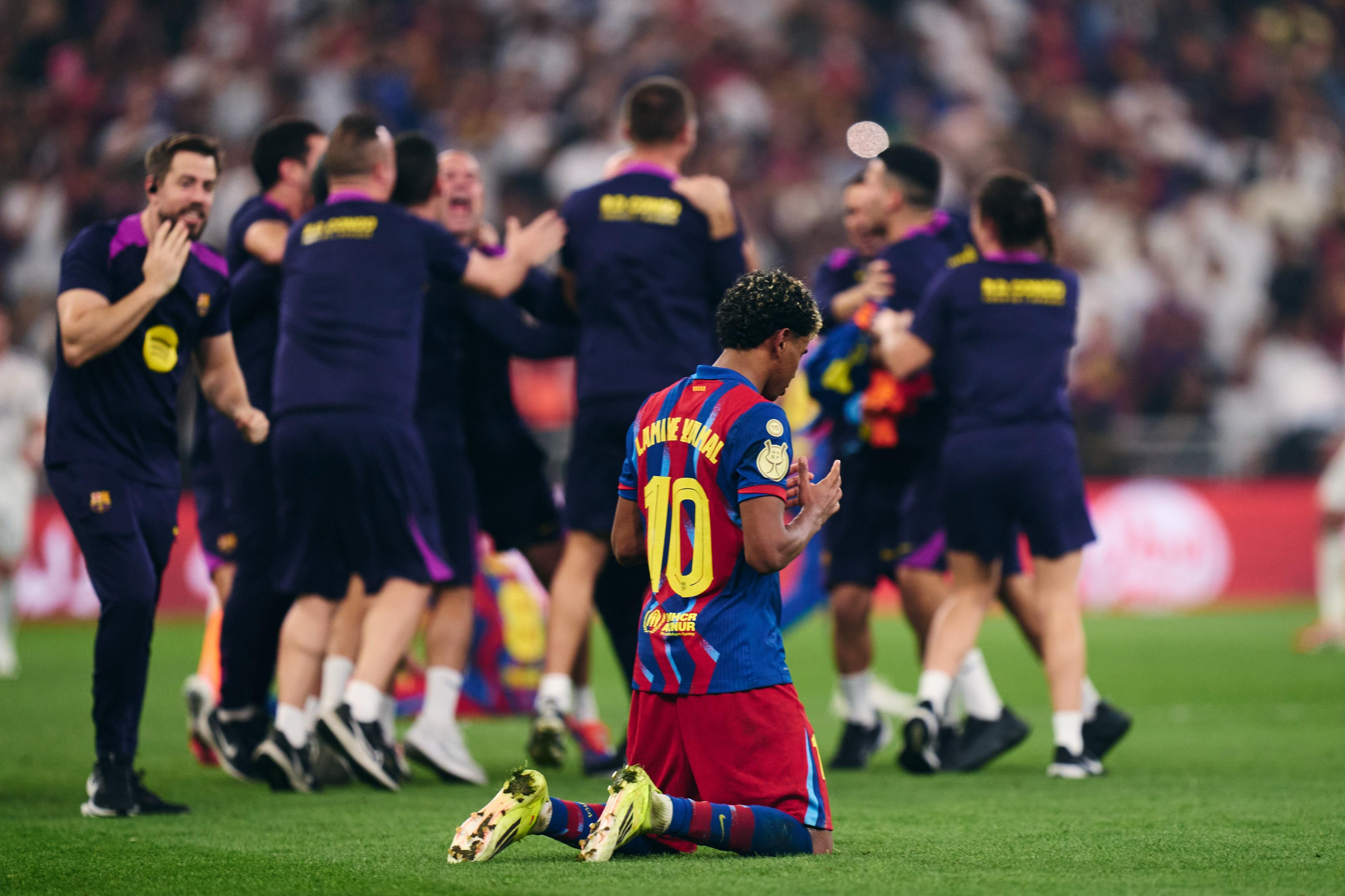 Lamine Yamal celebrates after FC Barcelona’s Spanish Super Cup victory over Real Madrid CF