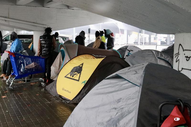 Some dozens of tents of migrants evicted from old high school in Badalona under a highway bridge