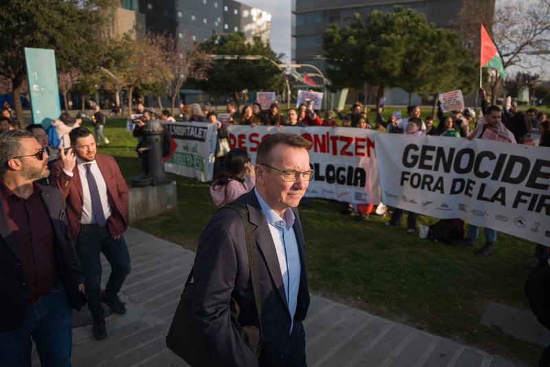 Banners denouncing tech companies and “genocide” greet attendees on the first day of MWC 2026