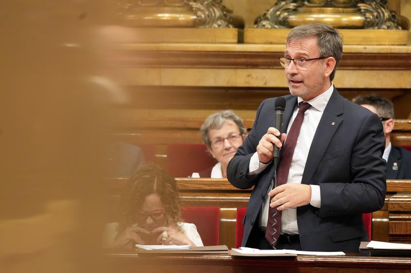 Minister of Language Policy Francesc Xavier Vila addresses Parliament