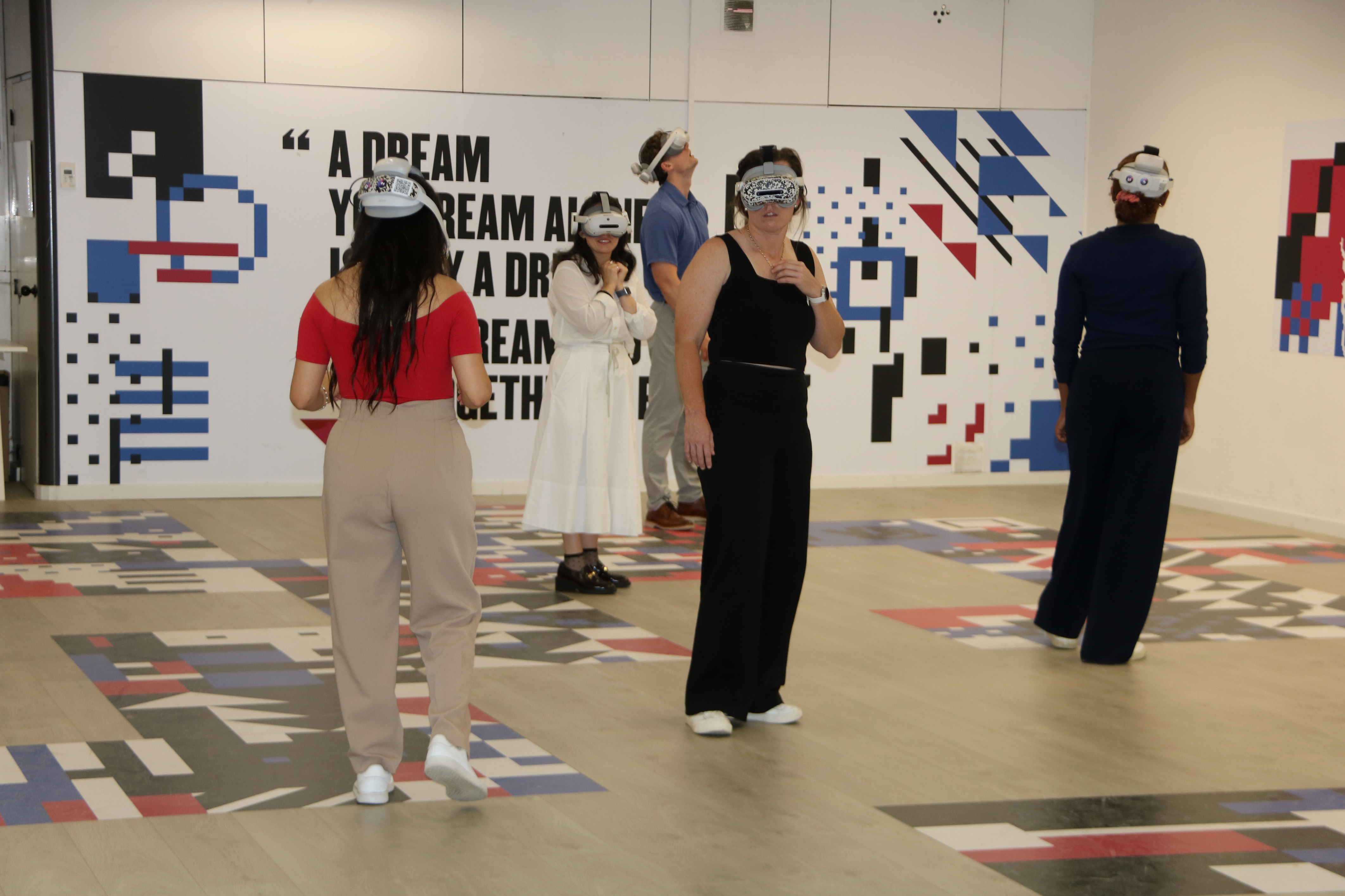 People taking part in one of the immersive experiences created by Univrse in Barcelona
