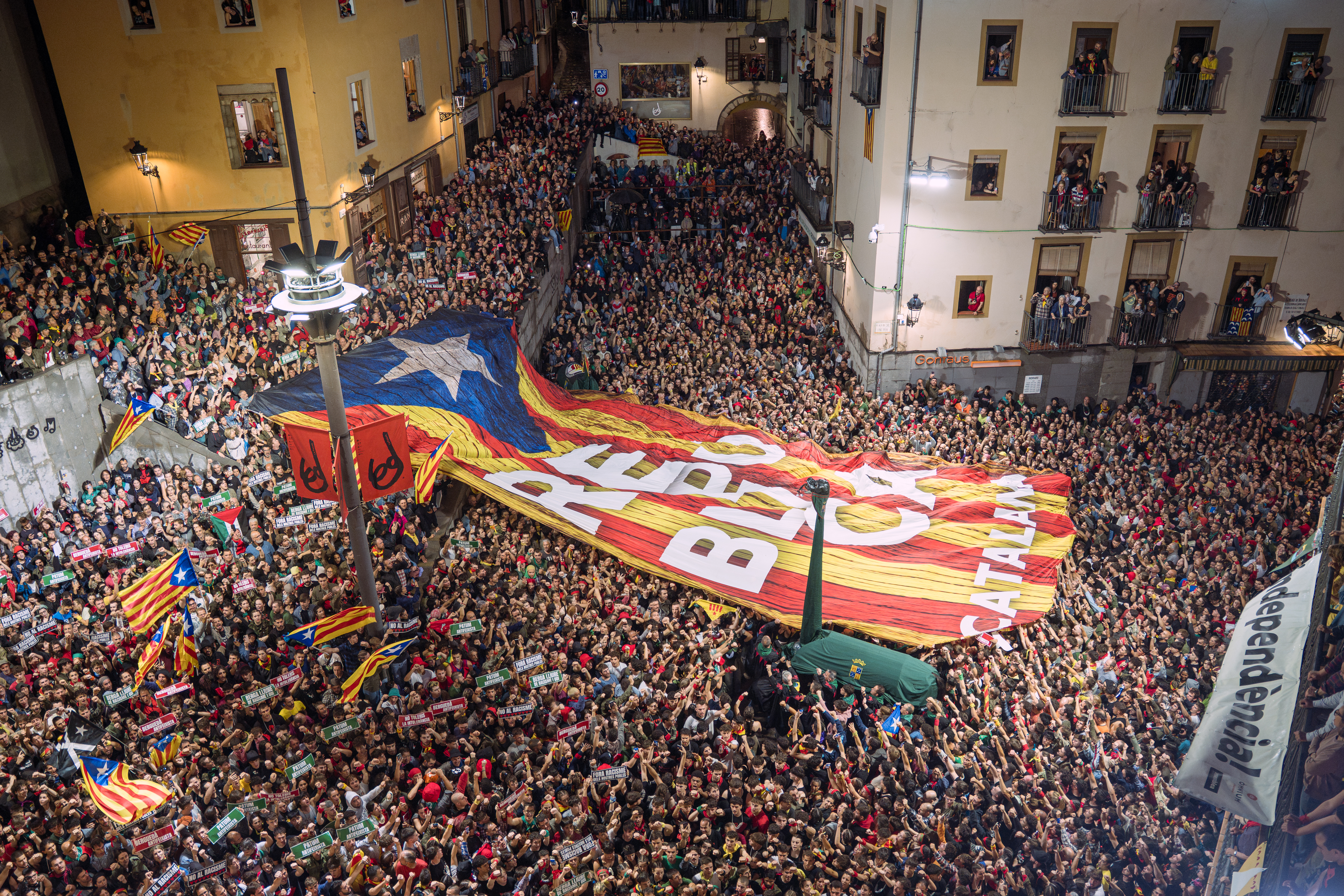 A large estelada (independence flag) unfurled in Plaça de Sant Pere in Berga