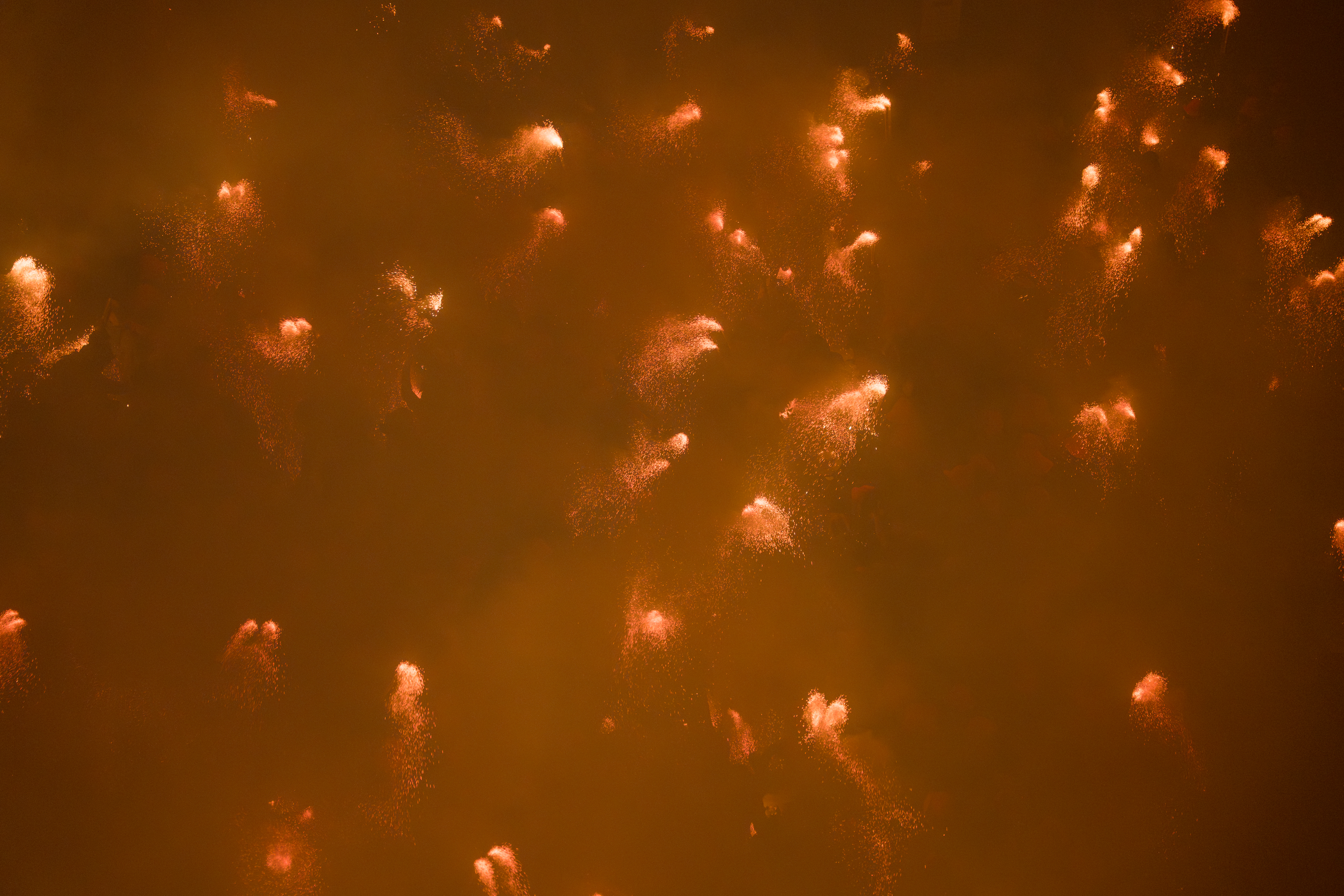 The Plaça de Sant Pere in Berga full of smoke and fire during La Patum Completa