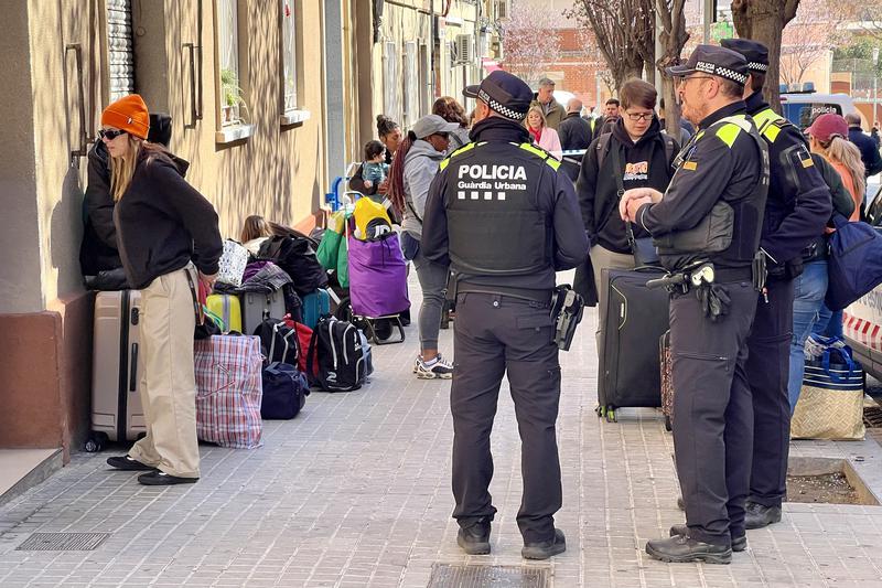 Residents of Badalona are evacuated from their homes on March 6