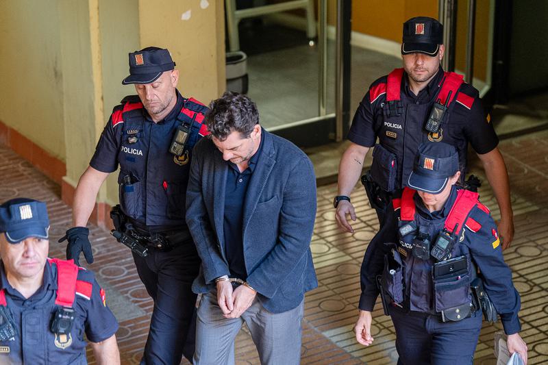 Jonathan Andic, son of Mango founder Isak Andic, is taken to court by police officers