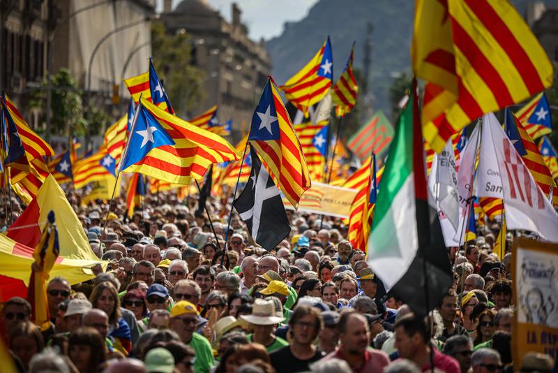 Flags flown by attendees at the Barcelona pro-independence rally on Catalonia's National Day 2024
