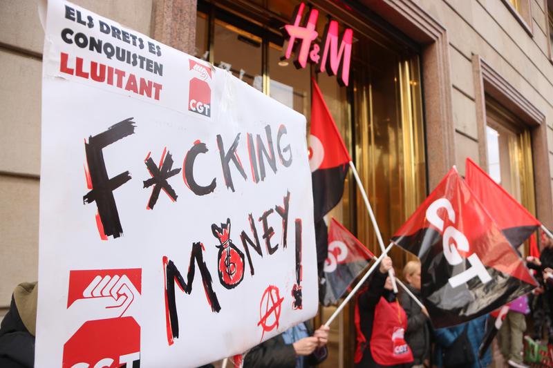 Strikers protest in front of H&M store in Barcelona