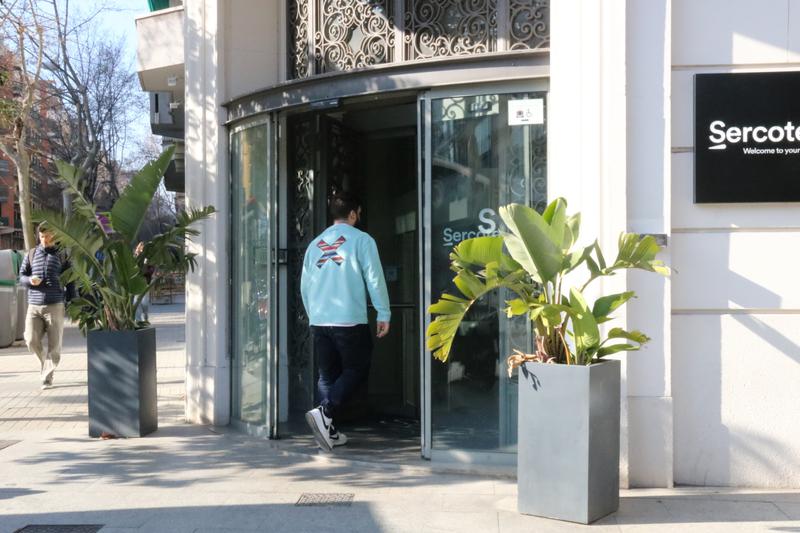 A person walks into a hotel lobby in Barcelona