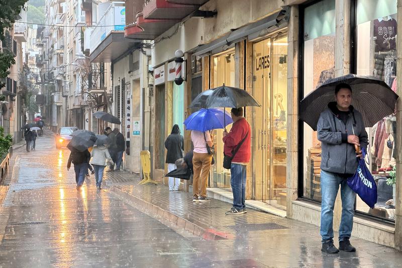 Rain in the shopping district of Blanes