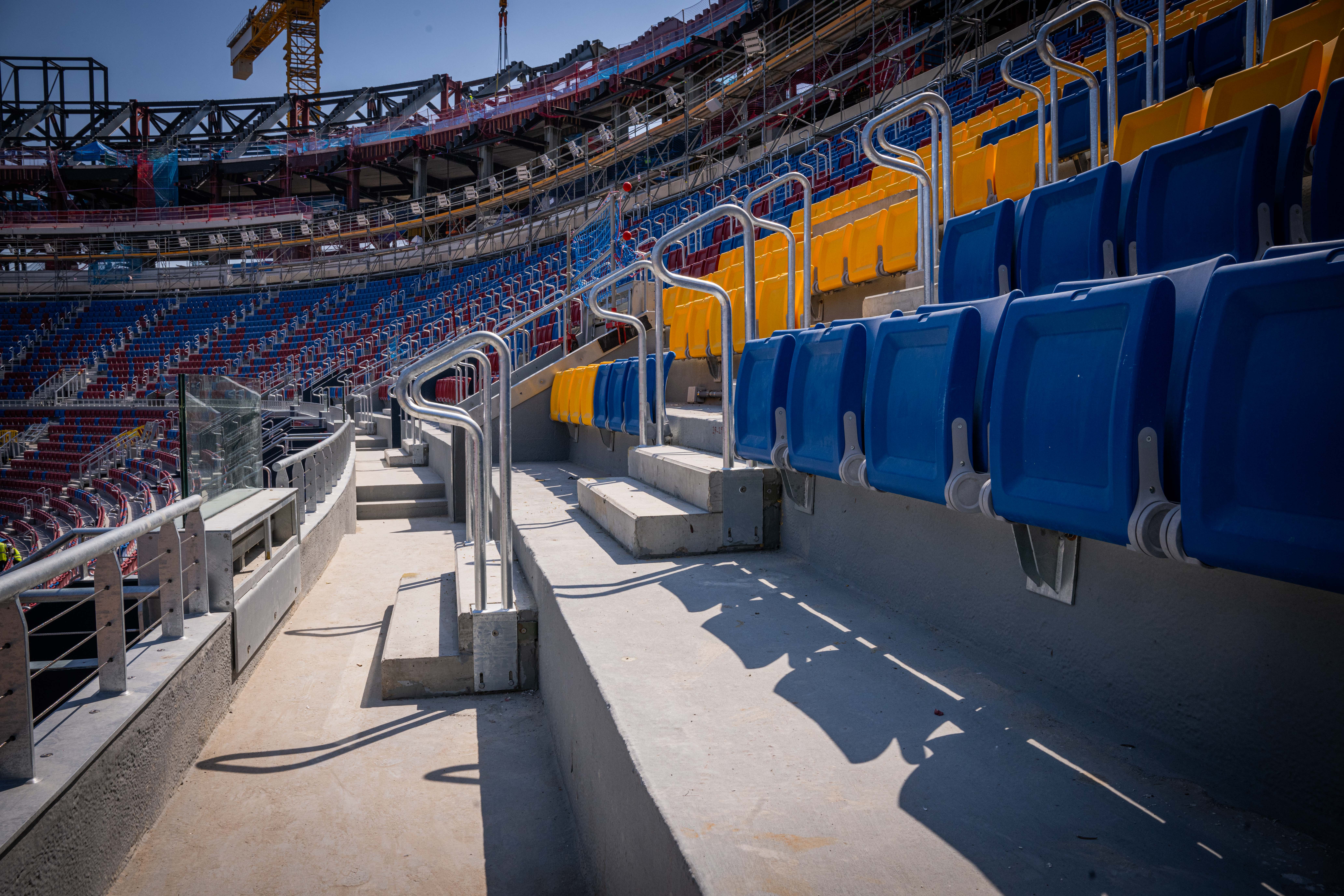 Chairs of FC Barcelona's Spotify Camp Nou feature the blue, red, and yellow colors