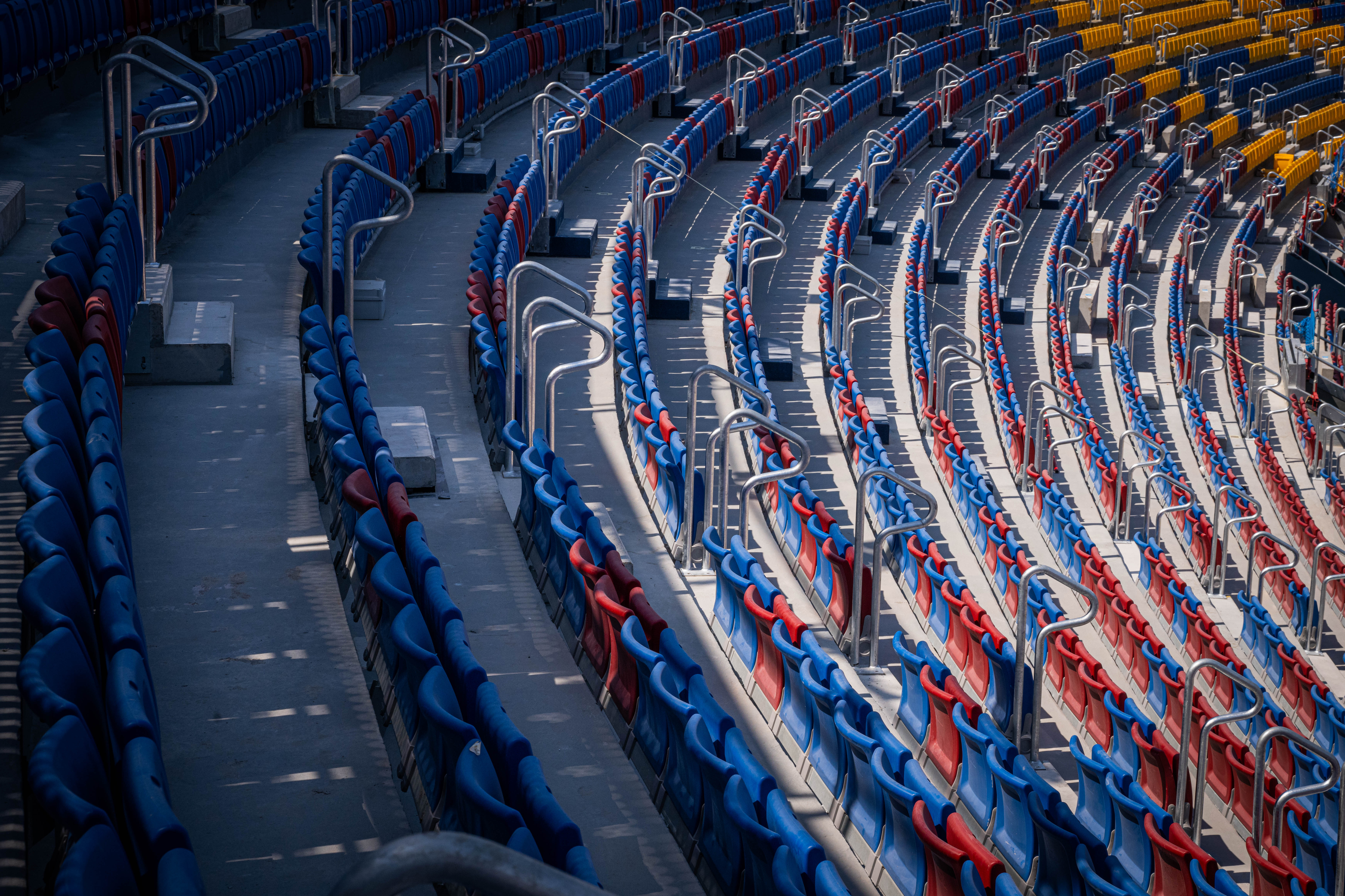 Chairs of FC Barcelona's Spotify Camp Nou feature the blue, red, and yellow colors