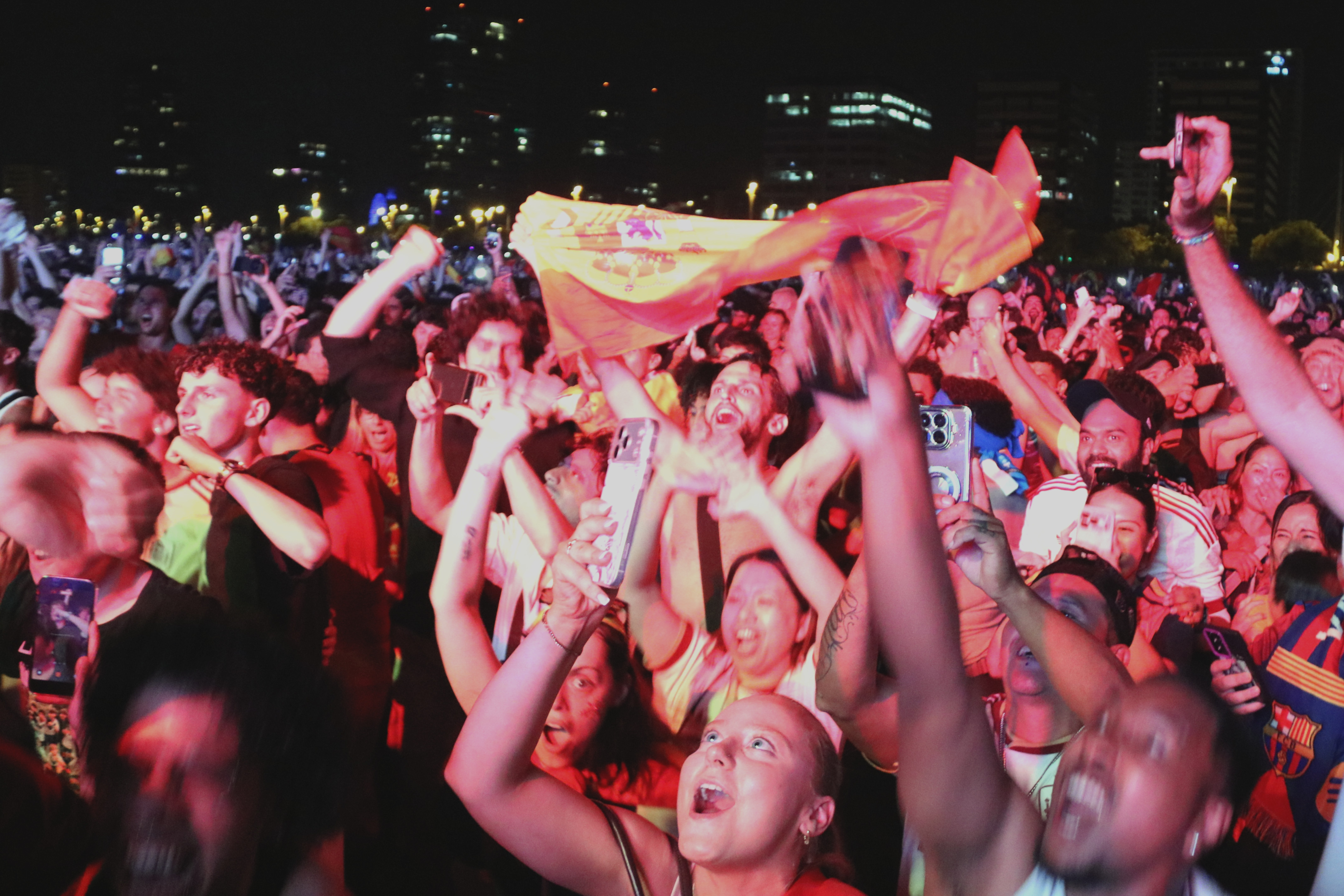 Spanish fans celebrate victory in the men's World Cup final in Barcelona
