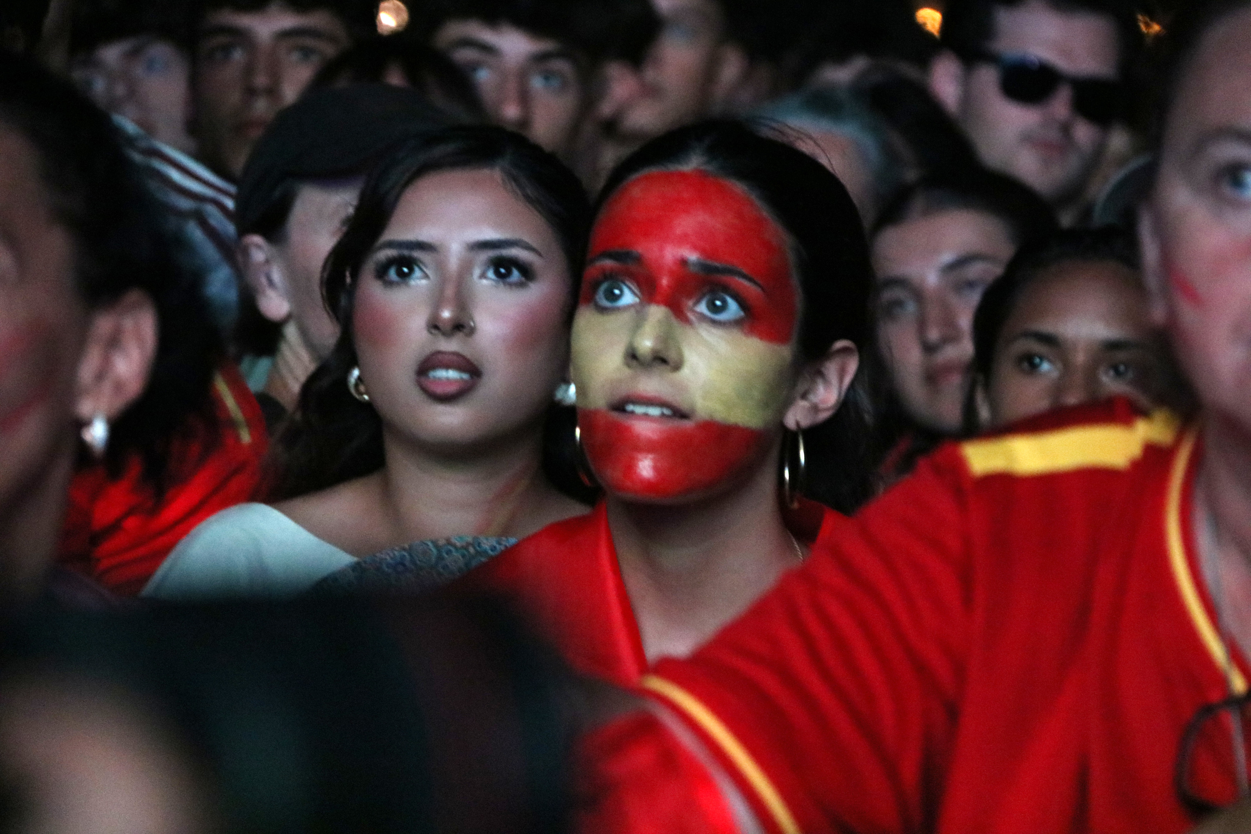 Supporters of the Spanish national team celebrate victory in the final of the men's World Cup in Barcelona