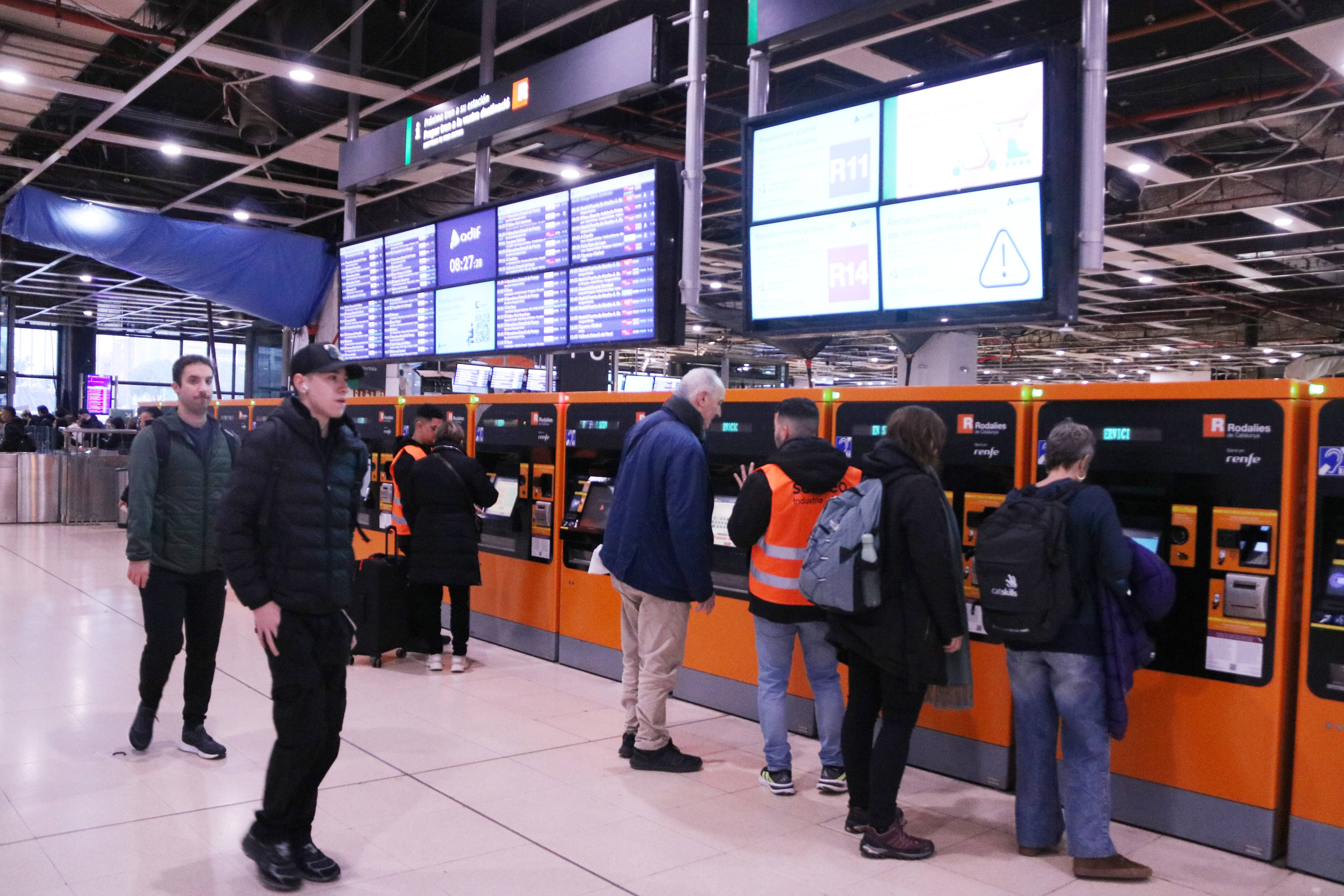 Rodalies passengers at Barcelona's Sants station