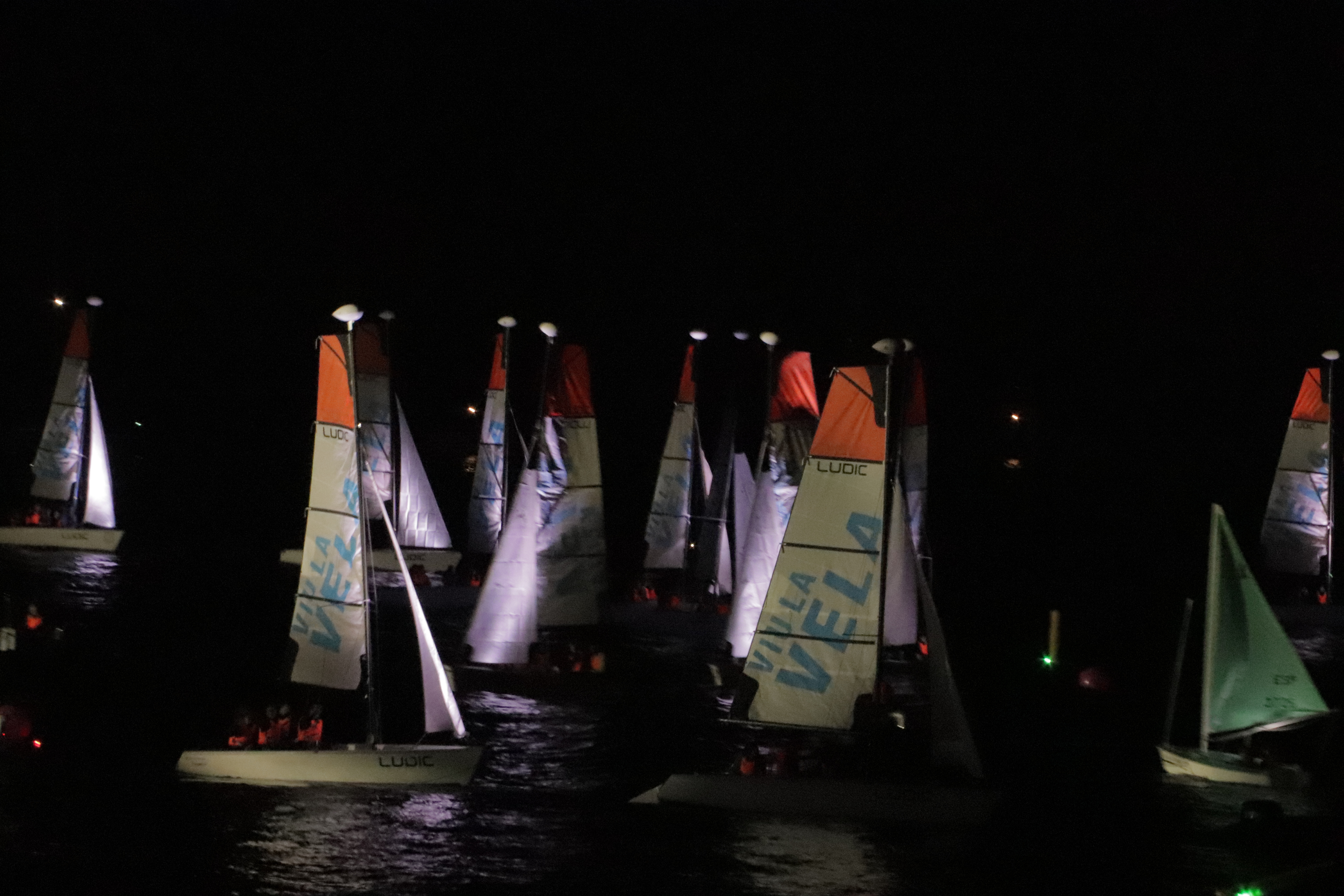 Some sail boats sailing on the sea during the America's Cup opening ceremony on October 10, 2024