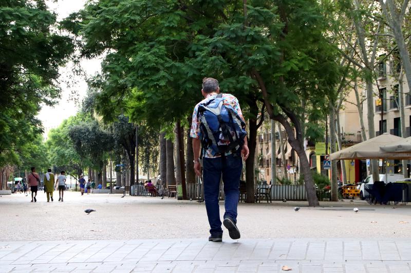 Tiziano, who is homeless, walking towards the Arrels Foundation
