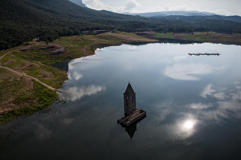 A drone view of the Pantà de Sau reservoir and its church surrounded by water on June 22, 2024 at 45% of its capacity