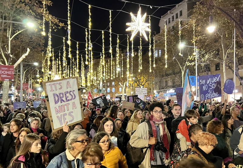A sign reading: 'it's a dress, not a yes' during the demonstration on the International Day for the Elimination of Violence Against Women in Barcelona on November 25, 2022