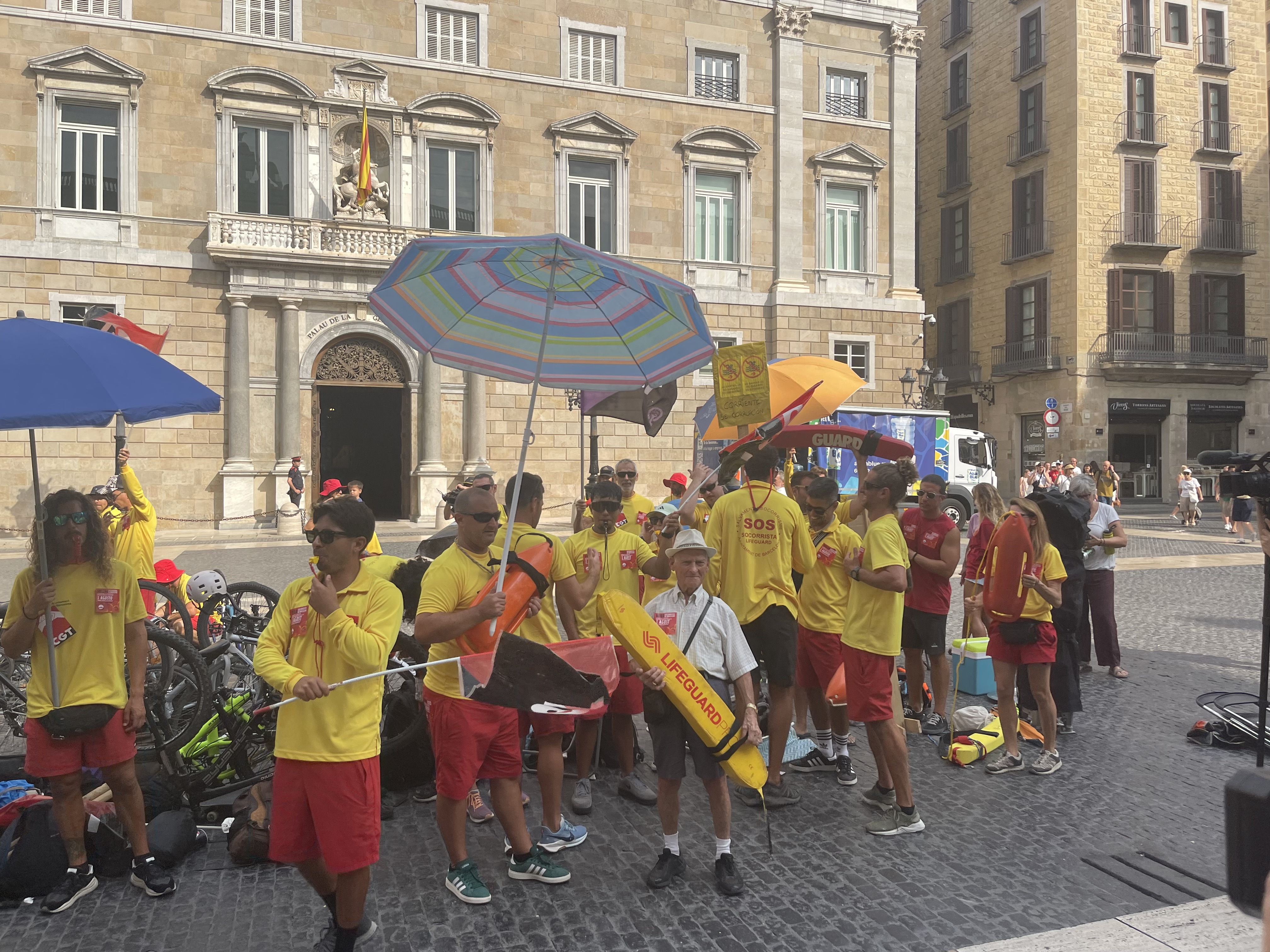 Lifeguards on indefinite strike hold a protest in Barcelona