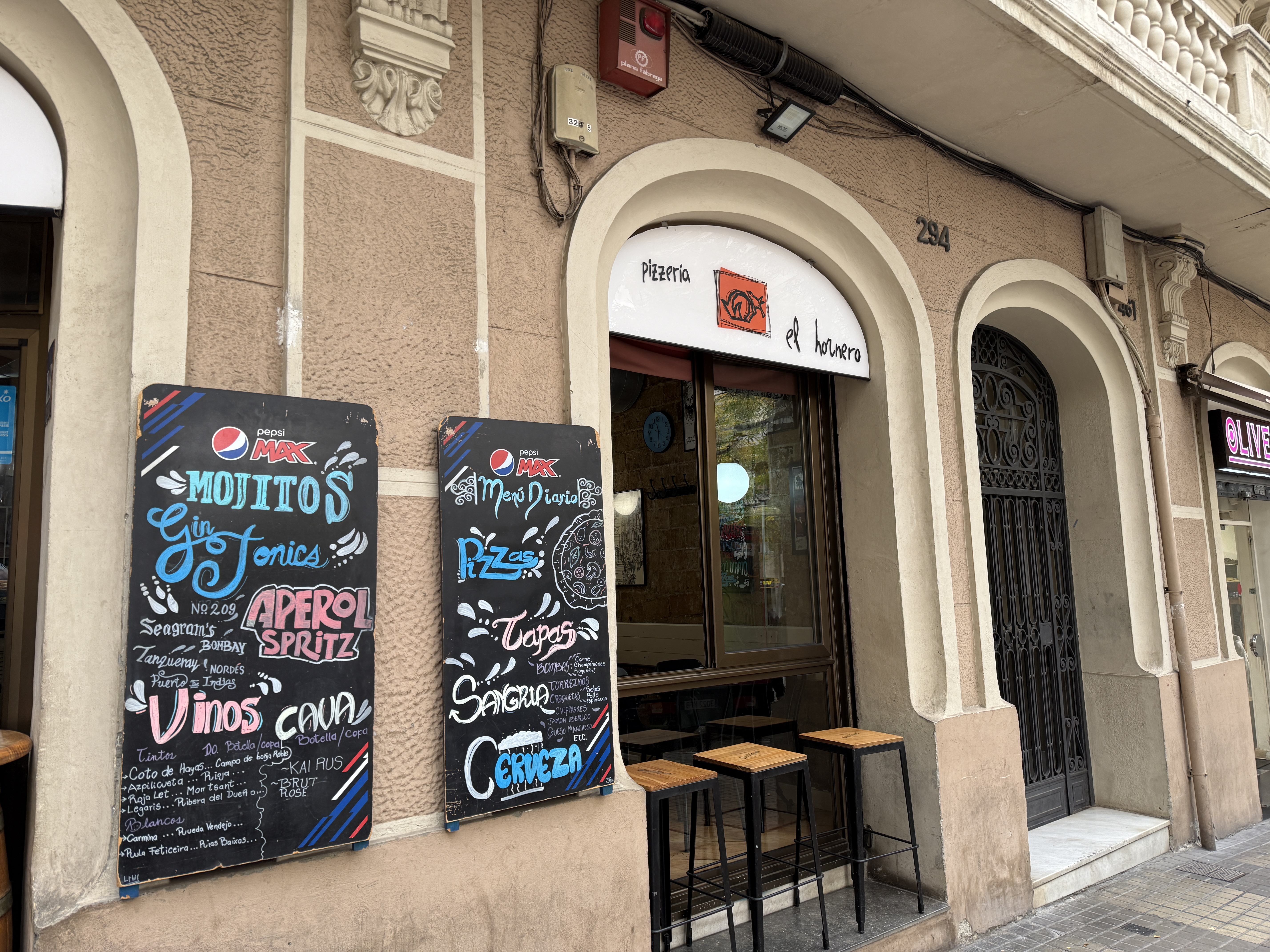 A restaurant in Eixample with signage in Spanish.
