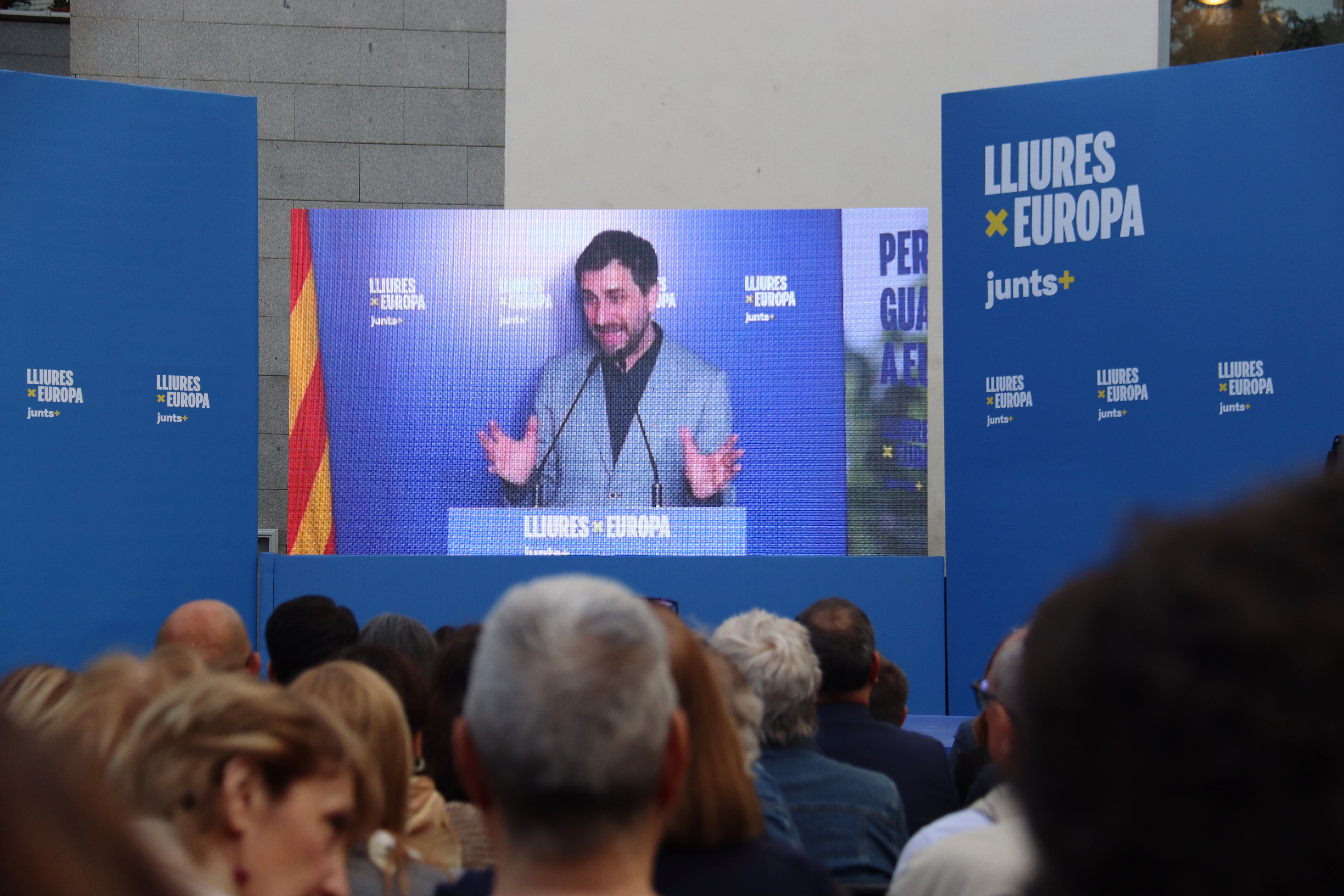 Junts candidate Toni Comín speaks remotely via video at campaign launch