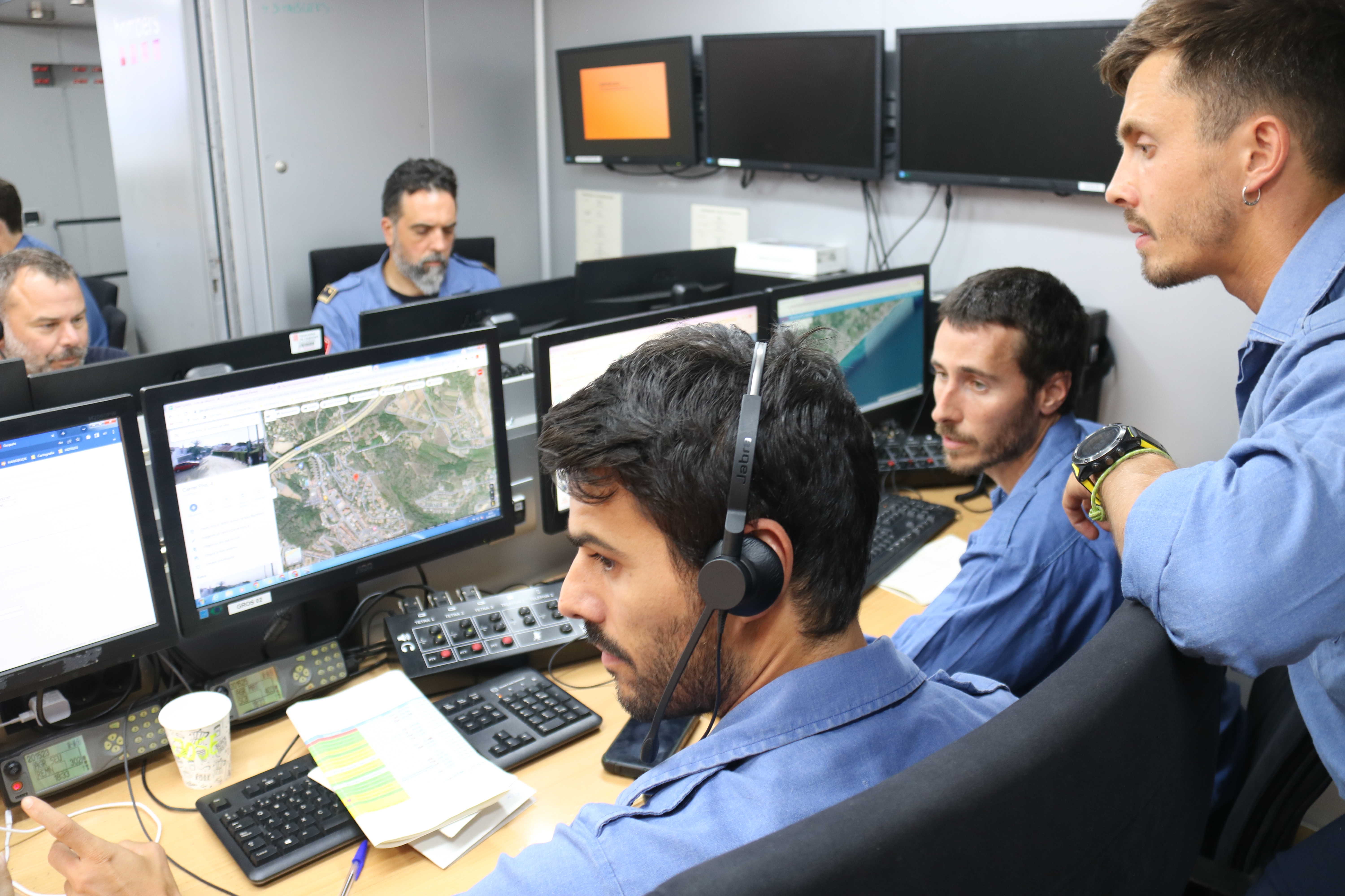 Bombers in the control center during a time of simultaneous wildfires