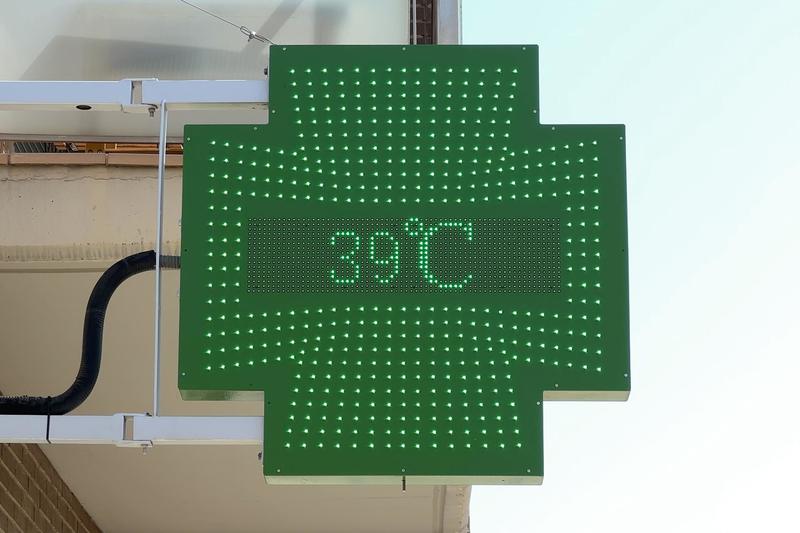 A pharmacy thermometer reading 39 degrees