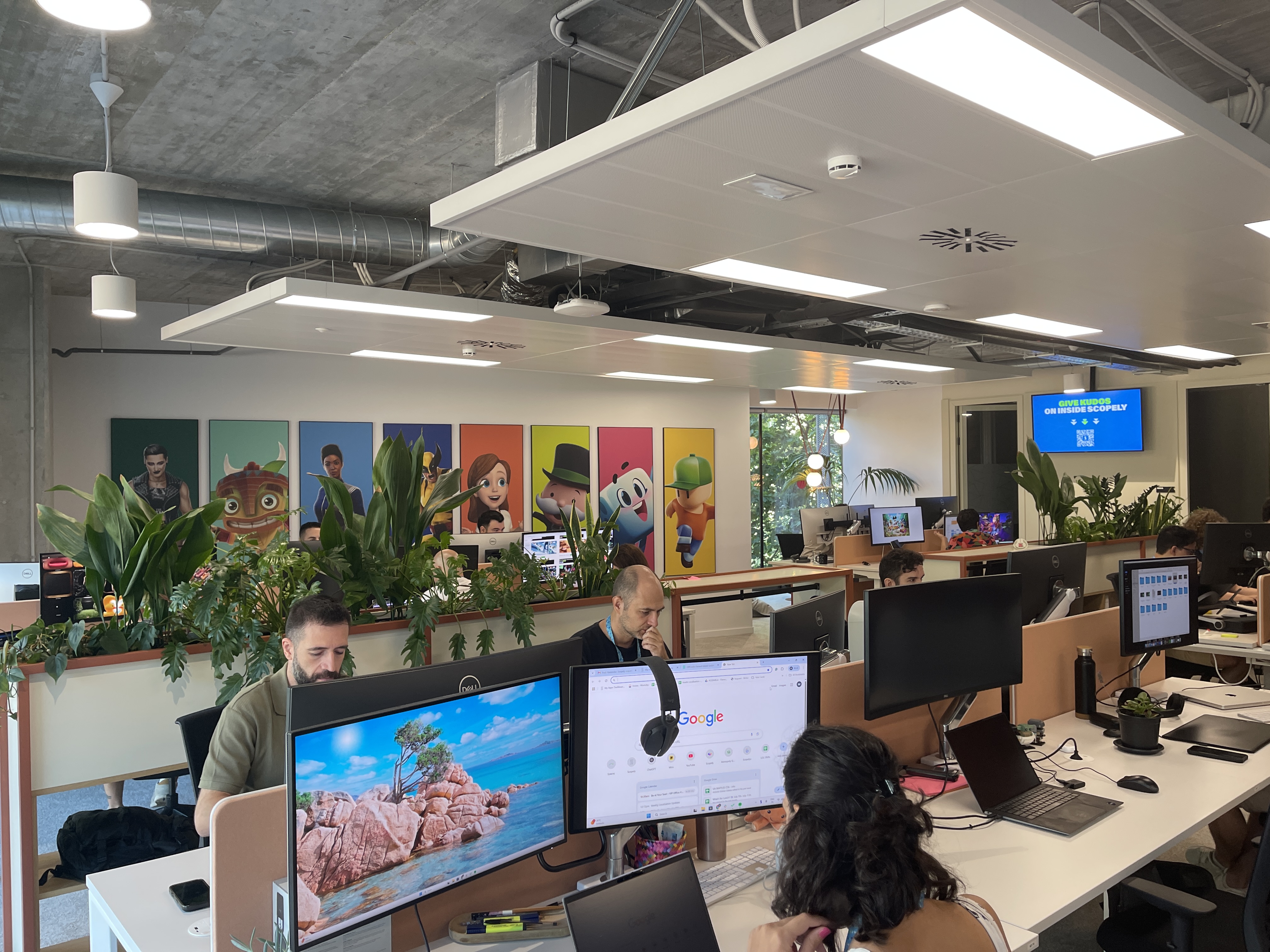 Employees working inside Scopely’s new Barcelona office