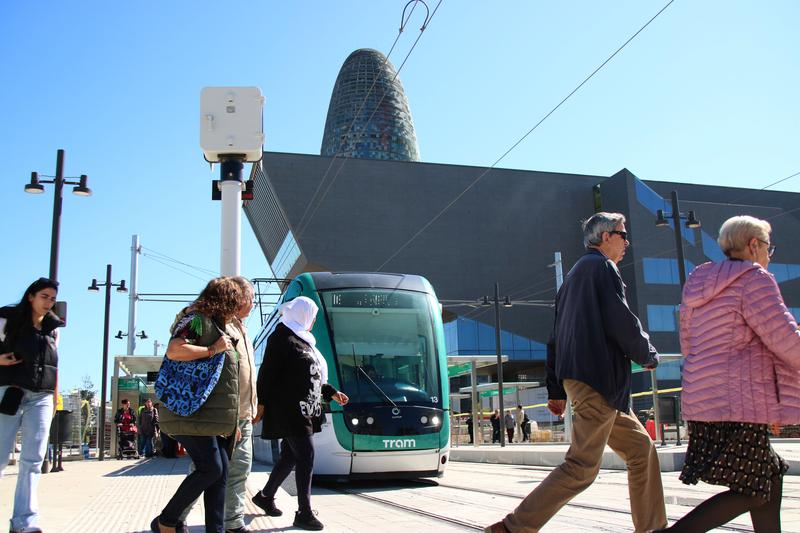 Passengers using the new tram stop.