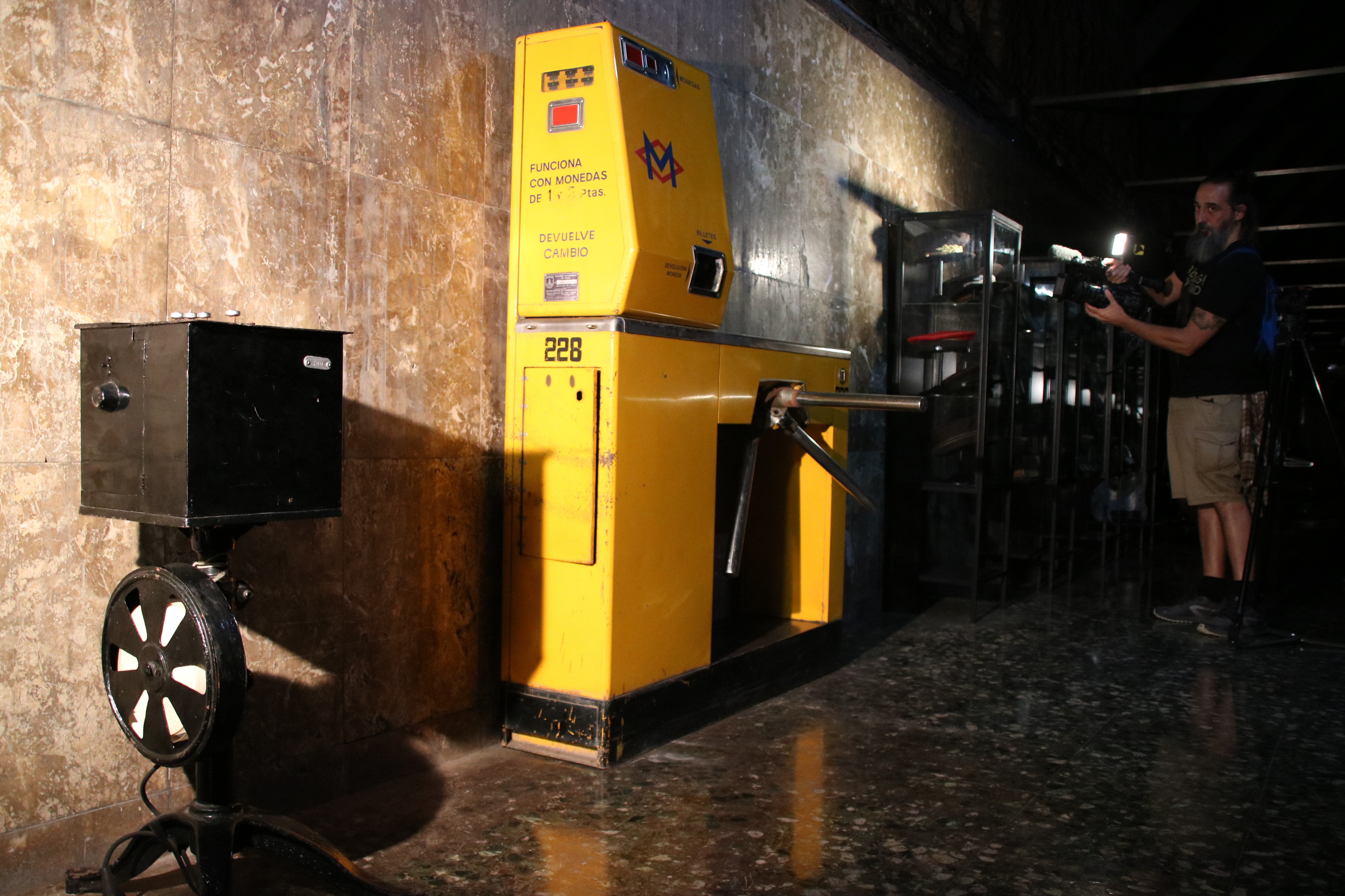 Old ticket validating machines from the Barcelona metro, dating back to the 1920s and 1960s, on display at the Gaudí ghost station